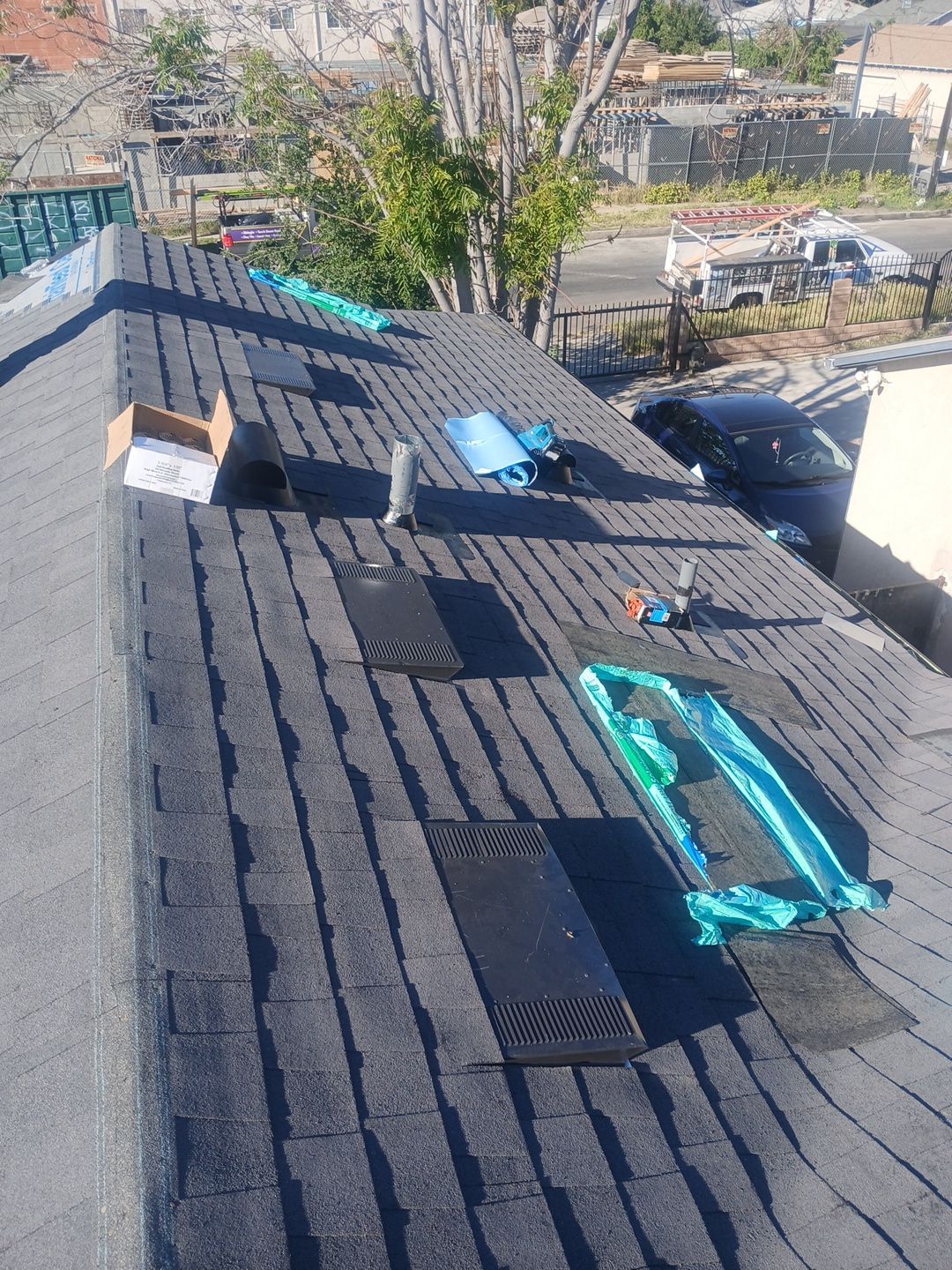 10-Mar 20 2026 04_40pm-LH8k Shingled roof with vents and roofing tools