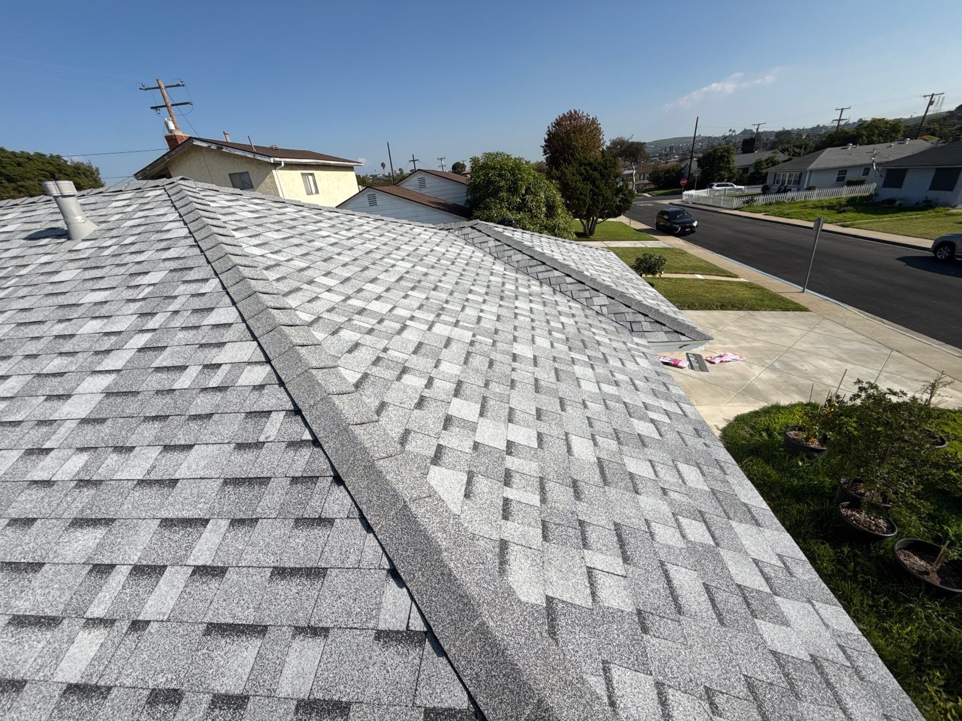 11-Dec 03 2025 12_10pm-Cy8t Gray shingle roof overlooking suburban neighborhood street