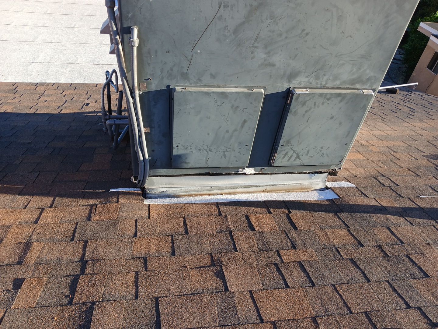 11-Mar 17 2026 08_00am-HCW3 Rooftop HVAC unit with metal flashing