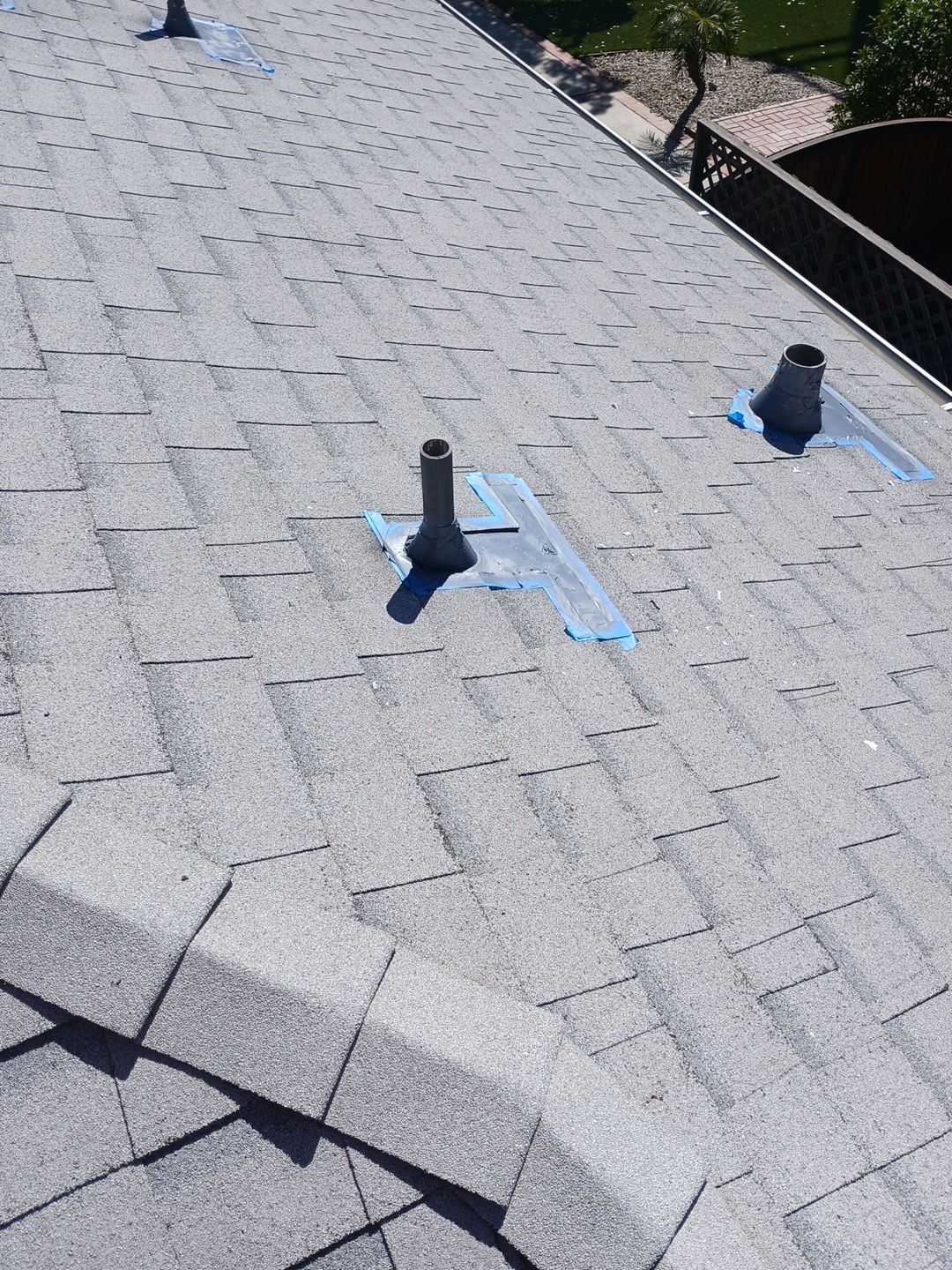 11-Mar 19 2026 10_59am-3E2B Asphalt shingle roof with vent pipes and flashing