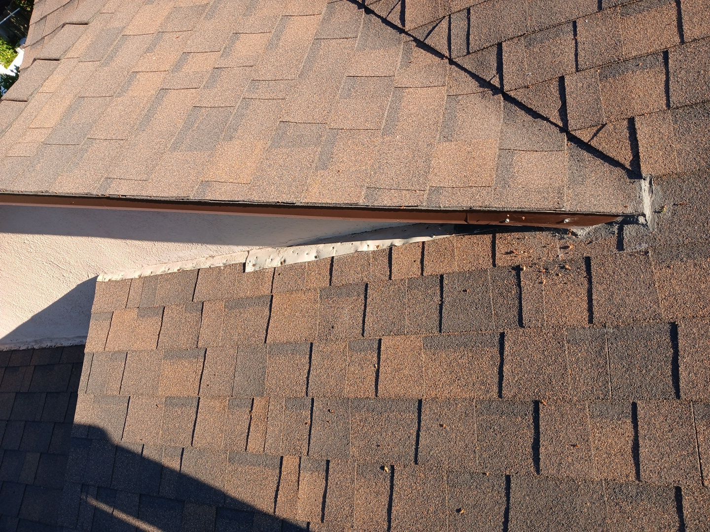 12-Mar 17 2026 08_00am-WFGP Damaged roof shingles and exposed flashing