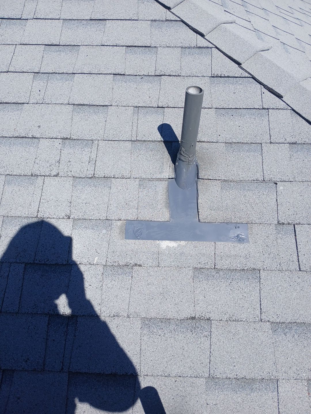 17-Mar 19 2026 11_56am-Qeqc Roof vent pipe with flashing on shingle roof