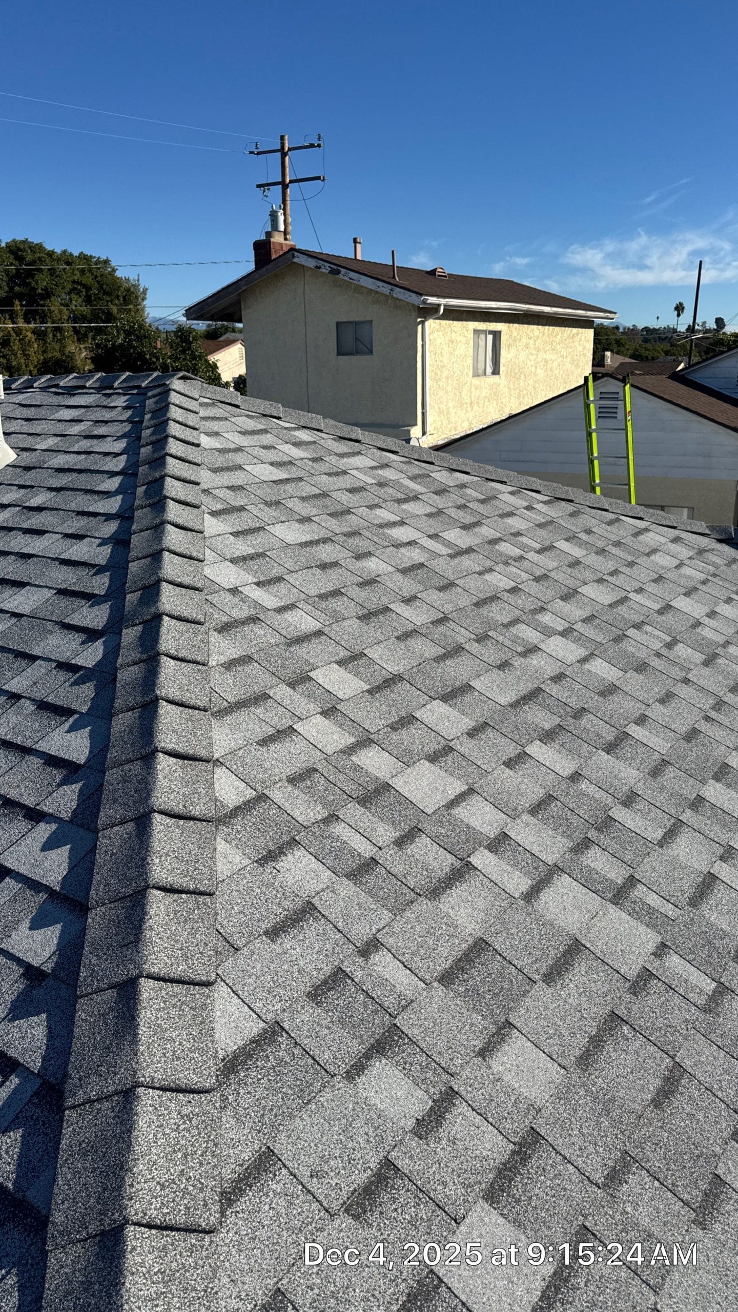 18-Dec 04 2025 09_15am-q4HJ Gray asphalt shingle roof with ridge line