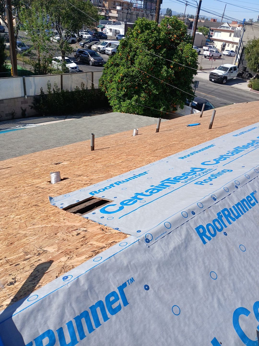 2-Mar 20 2026 10_27am-5Znw Roof underlayment installation on residential rooftop