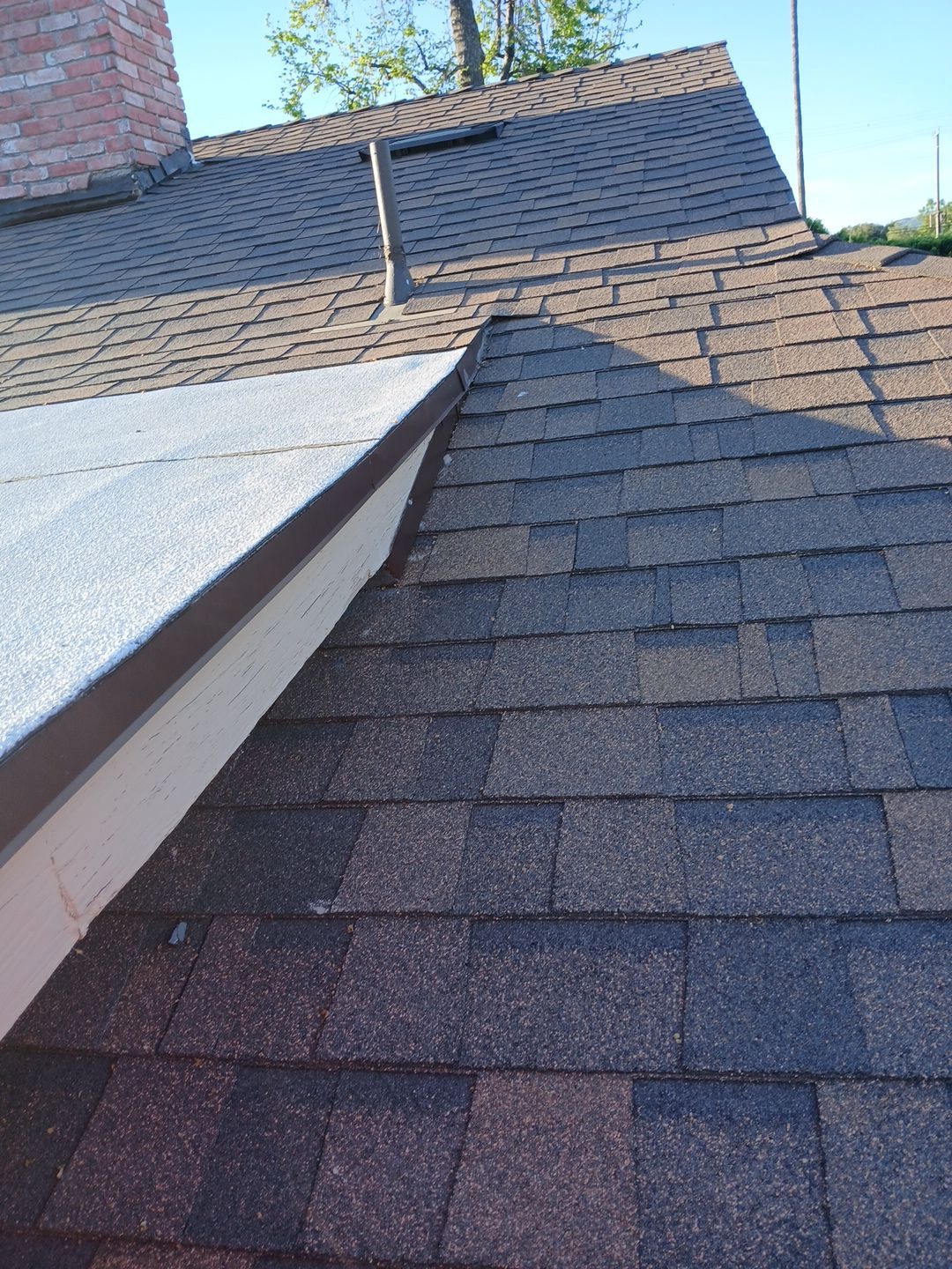 21-Mar 17 2026 08_01am-6wMD Asphalt shingle roof with chimney and vent pipe