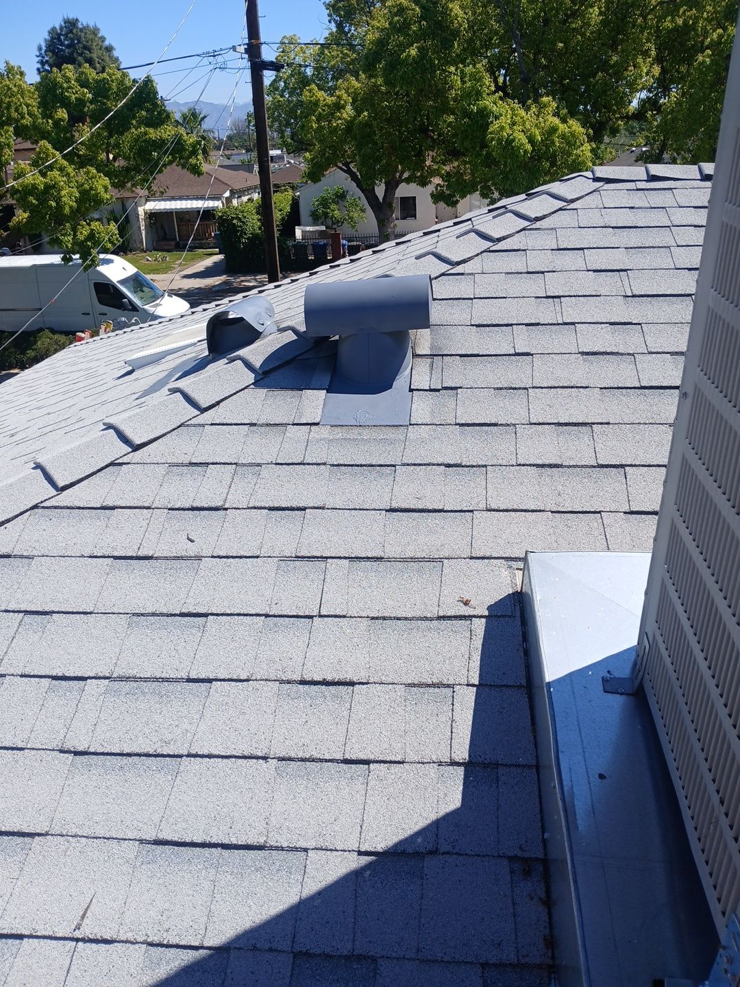 26-Mar 19 2026 11_56am-ZFVU Gray shingle roof with vents and HVAC unit