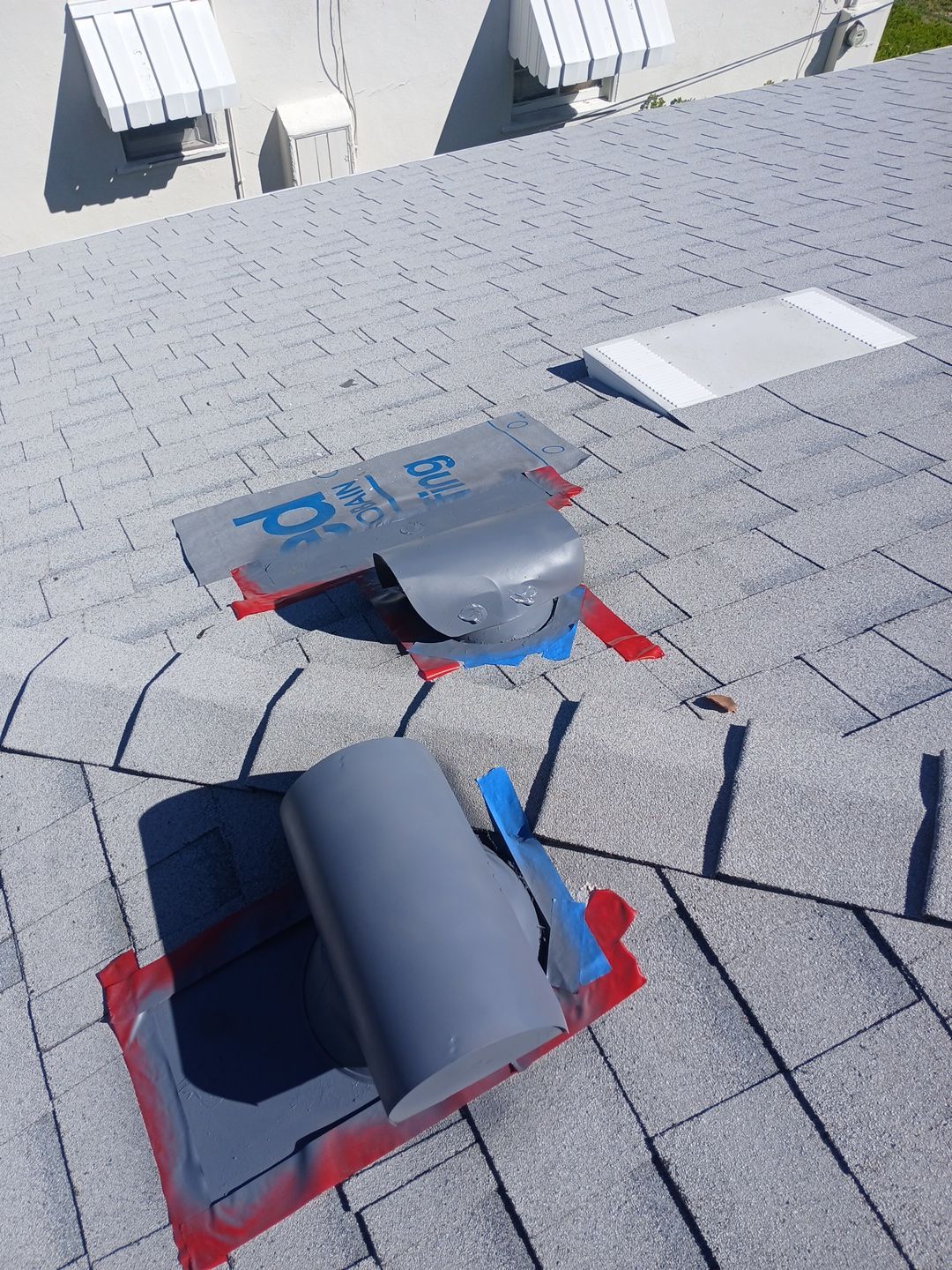 4-Mar 19 2026 10_59am-x71h Gray shingle roof with two vent pipes
