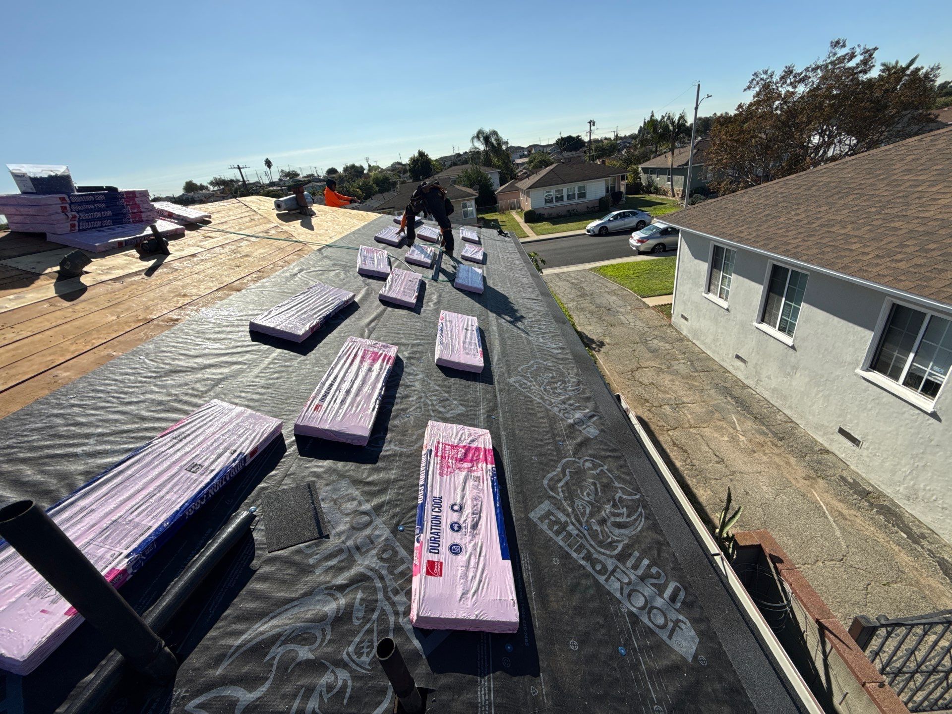 6-Dec 02 2025 10_23am-AMNs Roofers installing shingles on suburban home rooftop