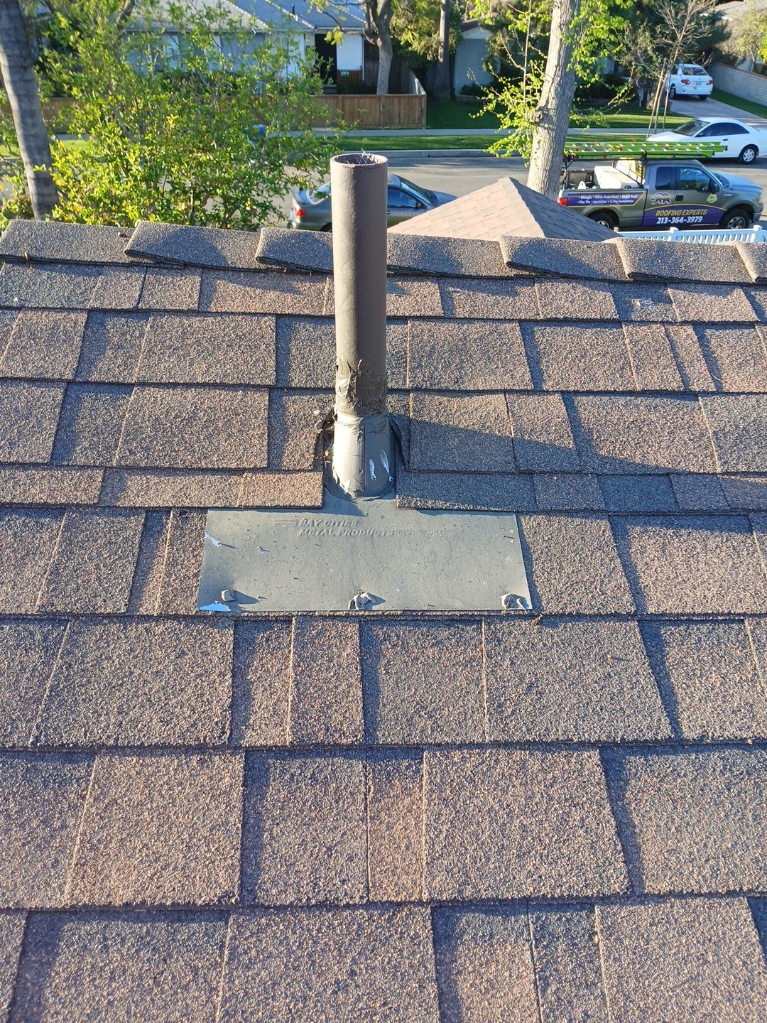 9-Mar 17 2026 08_00am-Shgf Roof vent pipe with metal flashing on shingles