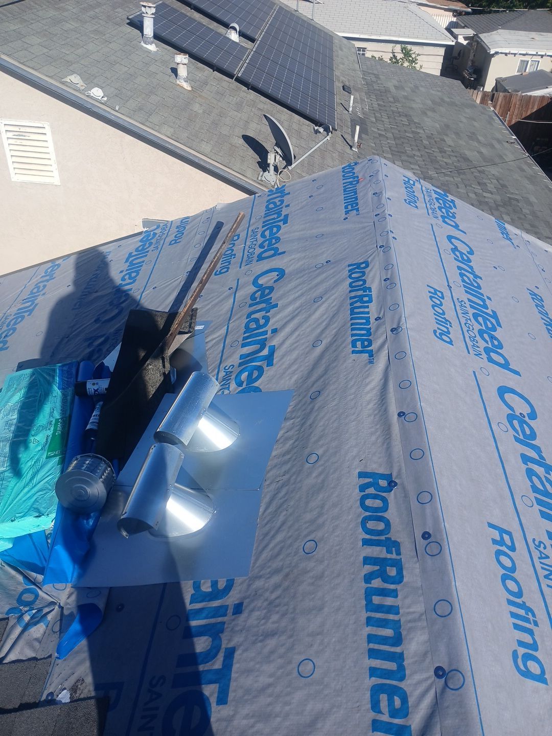 9-Mar 20 2026 04_39pm-eXYt Roof underlayment with vents and tools installed