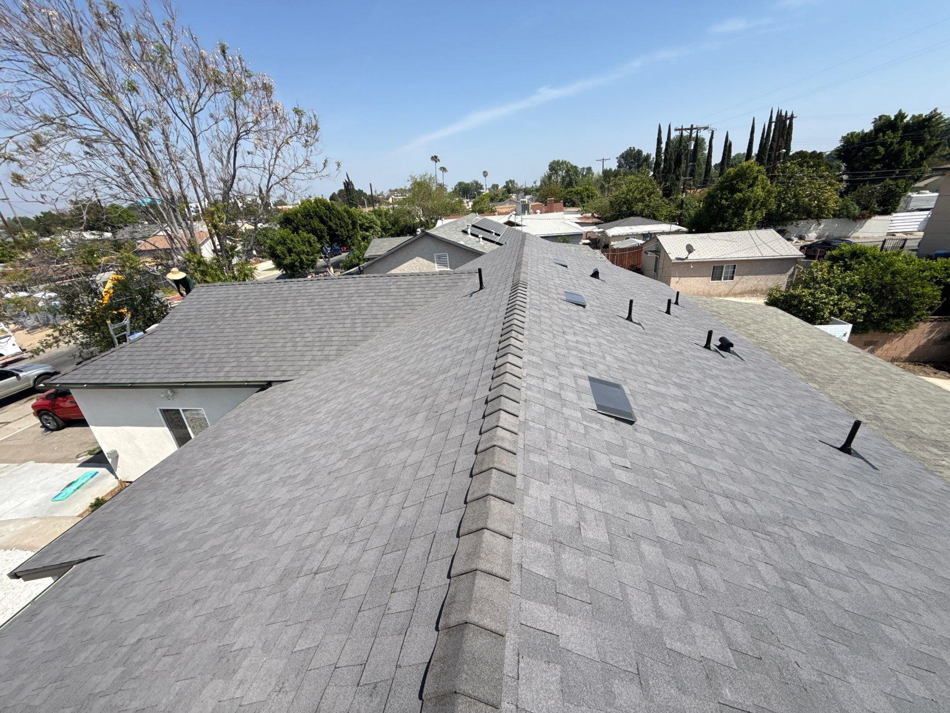 Before and After-12-Mar 23 2026 01_53pm-BcZV Gray shingle roof overlooking suburban neighborhood