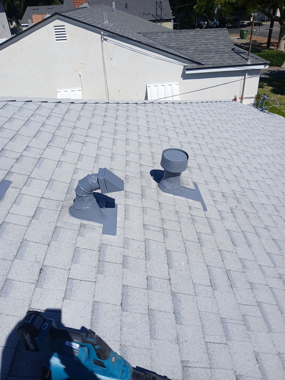 Before and After-19-Mar 19 2026 11_56am-JCVV Residential shingle roof with two metal vents