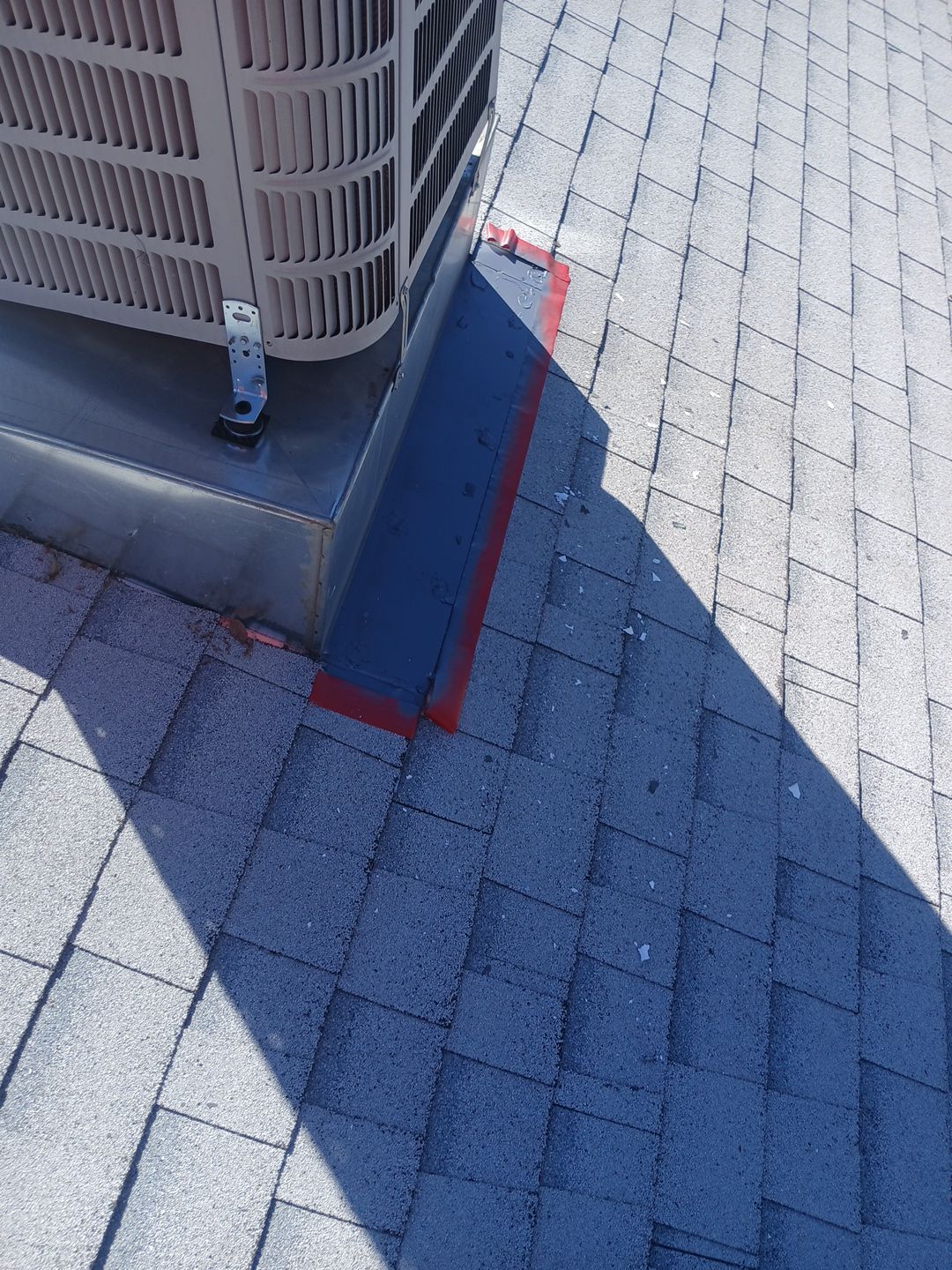 Before and After-9-Mar 19 2026 10_59am-EGjq Rooftop HVAC unit with metal flashing and sealant