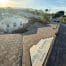 Residential rooftops at sunset with new roofing underlayment