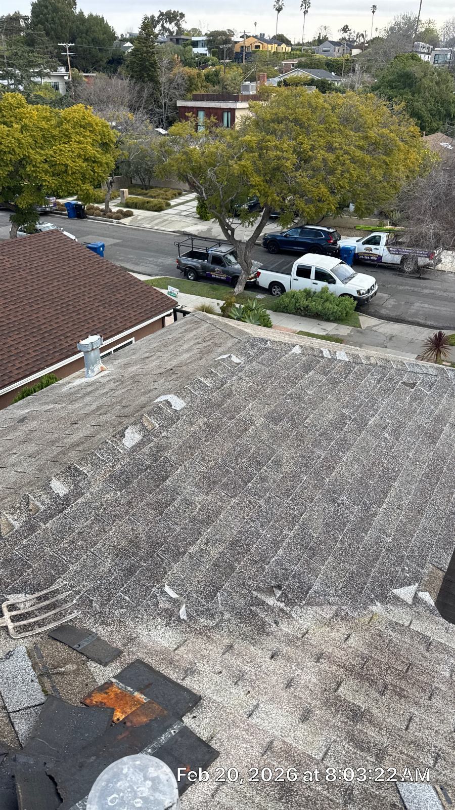 Aged asphalt shingle roof with pipe penetrations and flashing damage — Roof Replacement Inc