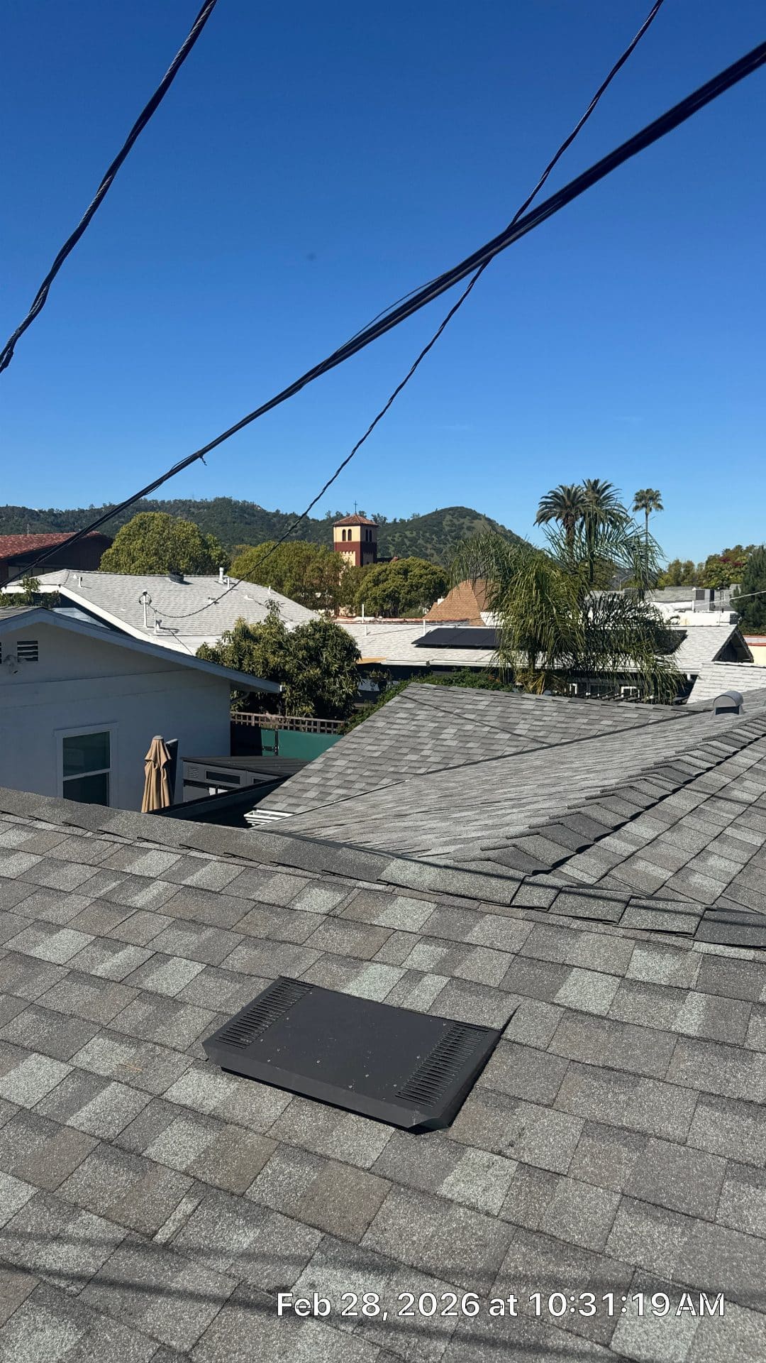Gray asphalt shingle roof with low-profile box vent installed | Roof Replacement Inc gray asphalt shingle roof with low-profile box vent installed — Roof Replacement Inc