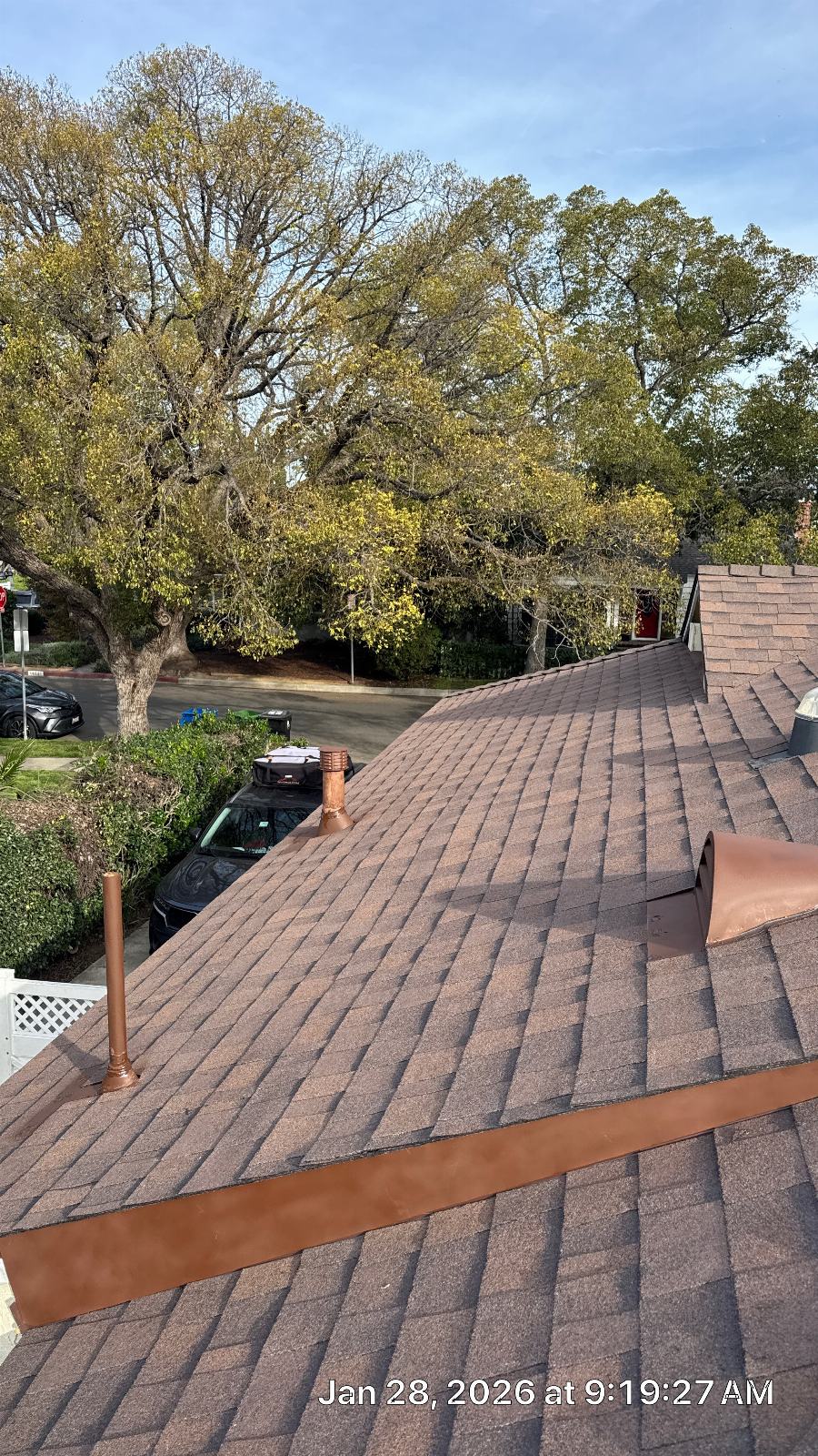 Asphalt shingle roof with copper pipe vents and flashing — Roof Replacement Inc
