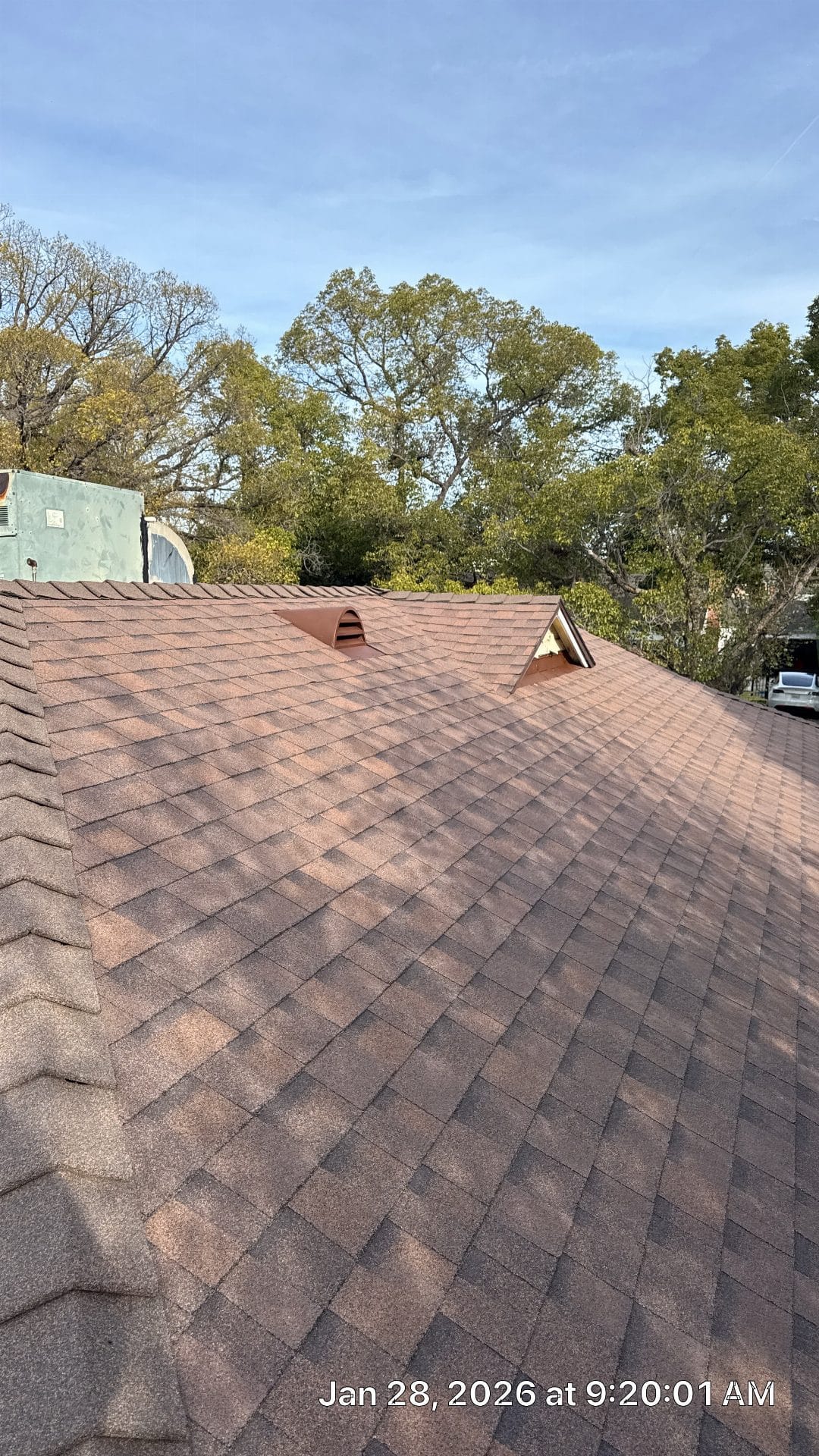 Brown asphalt shingle roof with two dormer vents installed | Roof Replacement Inc Brown asphalt shingle roof with two dormer vents installed — Roof Replacement Inc