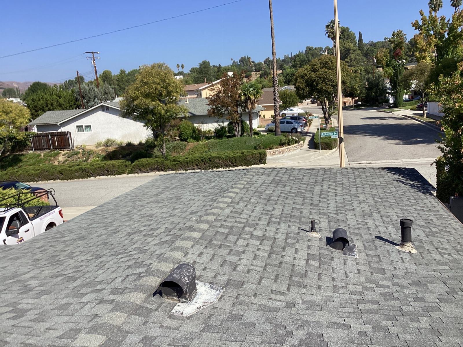 Gray asphalt shingle roof with pipe boots and vent penetrations in Calabasas | Roof Replacement Inc gray asphalt shingle roof with pipe boots and vent penetrations — Calabasas — Roof Replacement Inc