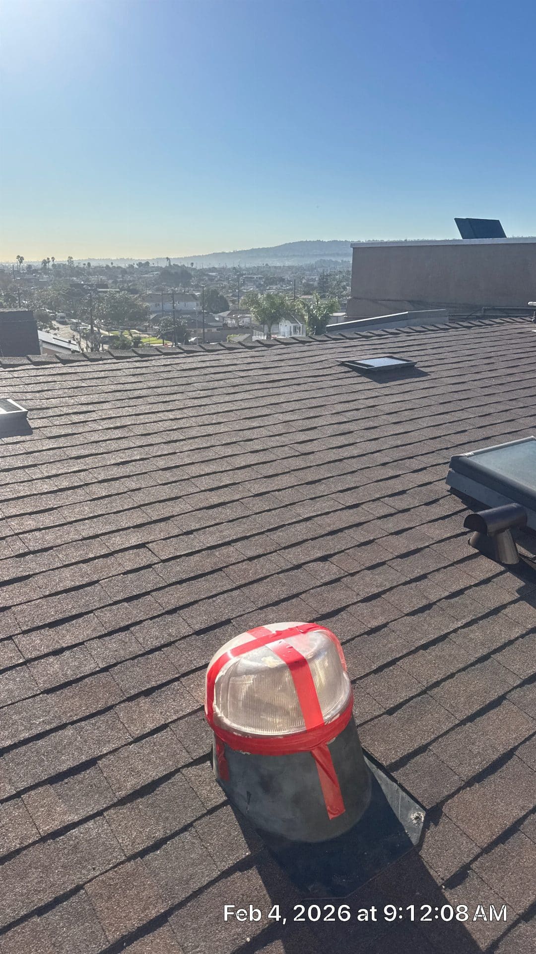 Asphalt shingle roof with tubular skylight, flat skylights visible | Roof Replacement Inc Asphalt shingle roof with tubular skylight, flat skylights visible — Roof Replacement Inc
