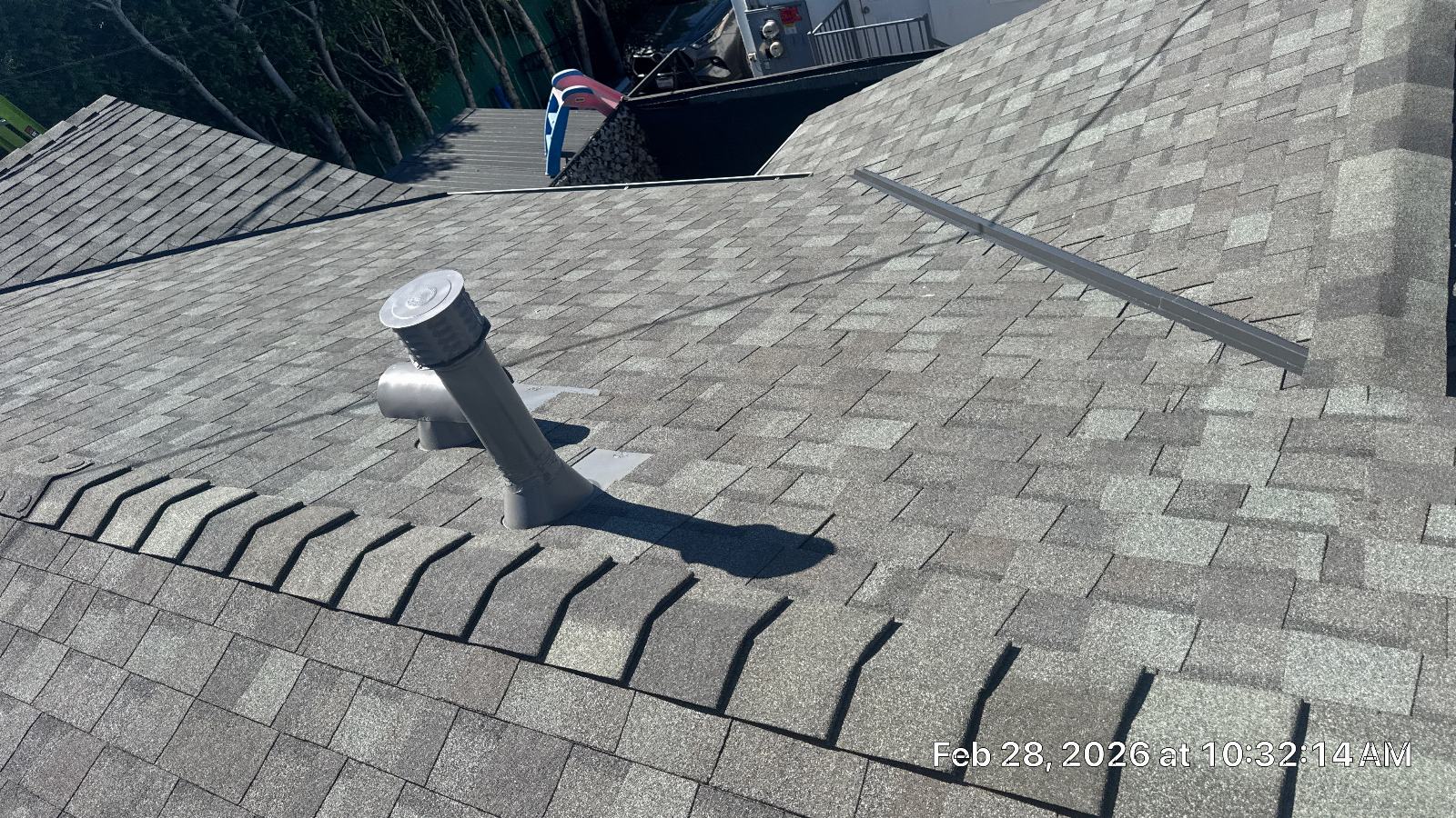 Gray asphalt shingle roof with plumbing vent pipe and flashing | Roof Replacement Inc gray asphalt shingle roof with plumbing vent pipe and flashing — Roof Replacement Inc