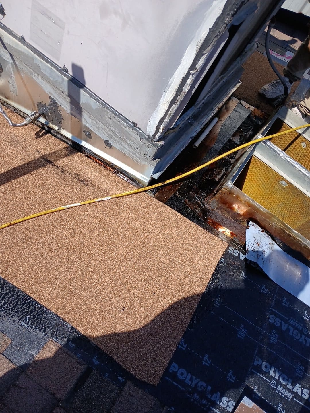 Flat roof repair with Polyglass underlayment, metal flashing, and gravel cap sheet | Roof Replacement Inc Flat roof repair with Polyglass underlayment, metal flashing, and gravel cap sheet — Roof Replacement Inc