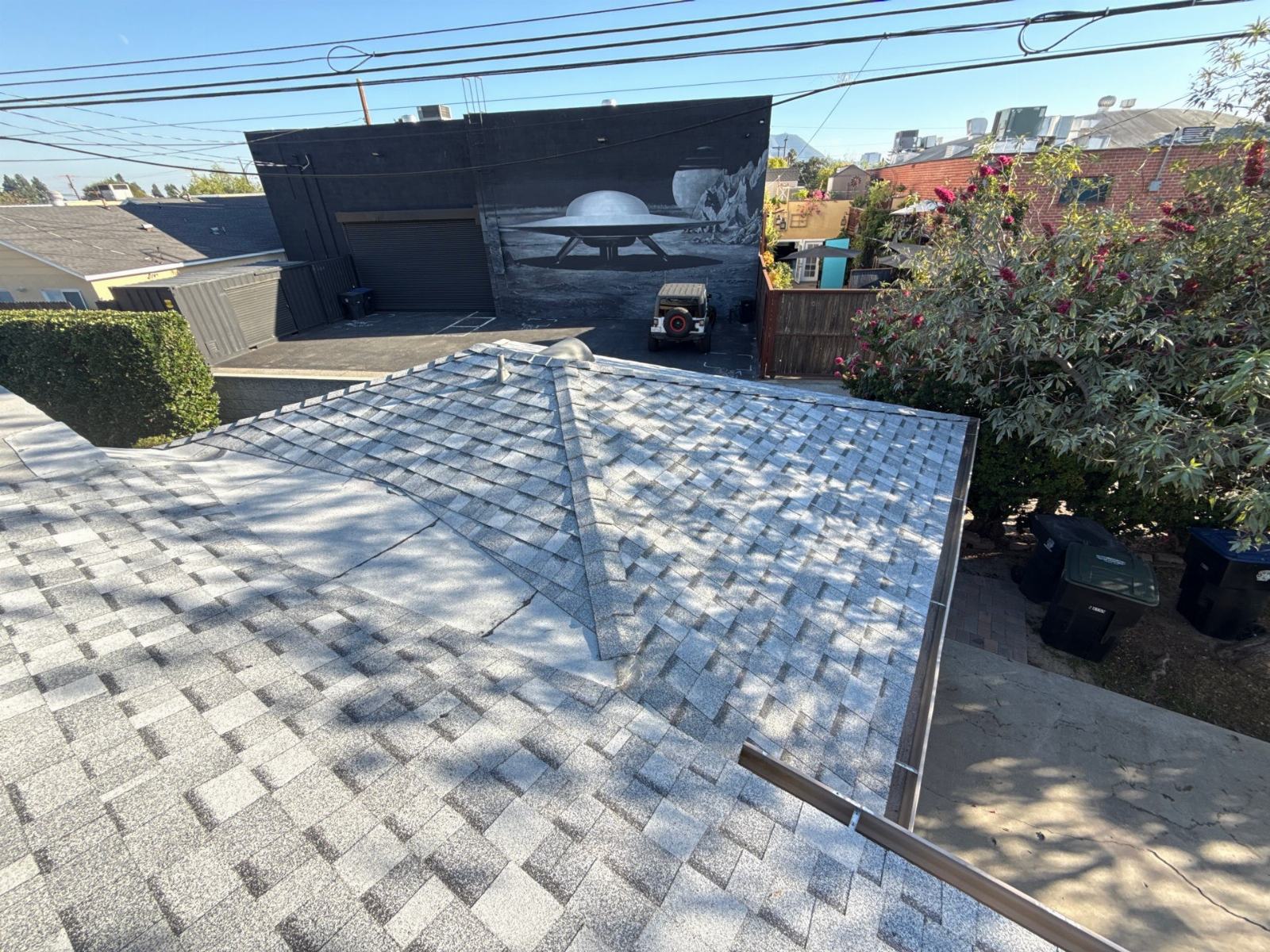 gray asphalt shingle roof with hip valleys and metal drip edge — Roof Replacement Inc