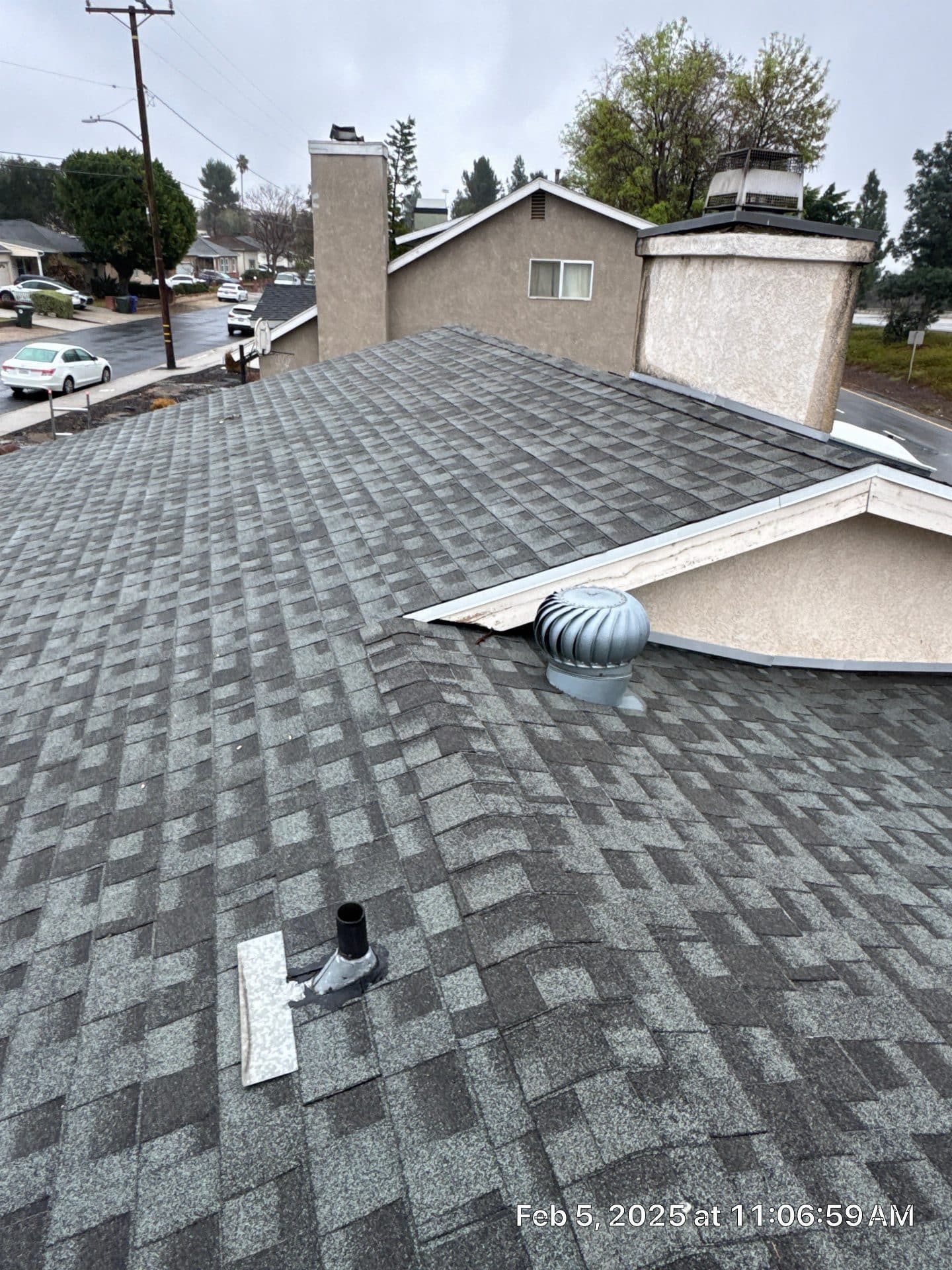 Gray asphalt shingle roof with turbine vent and pipe boot in La Crescenta-Montrose | Roof Replacement Inc gray asphalt shingle roof with turbine vent and pipe boot — La Crescenta-Montrose — Roof Replacement Inc