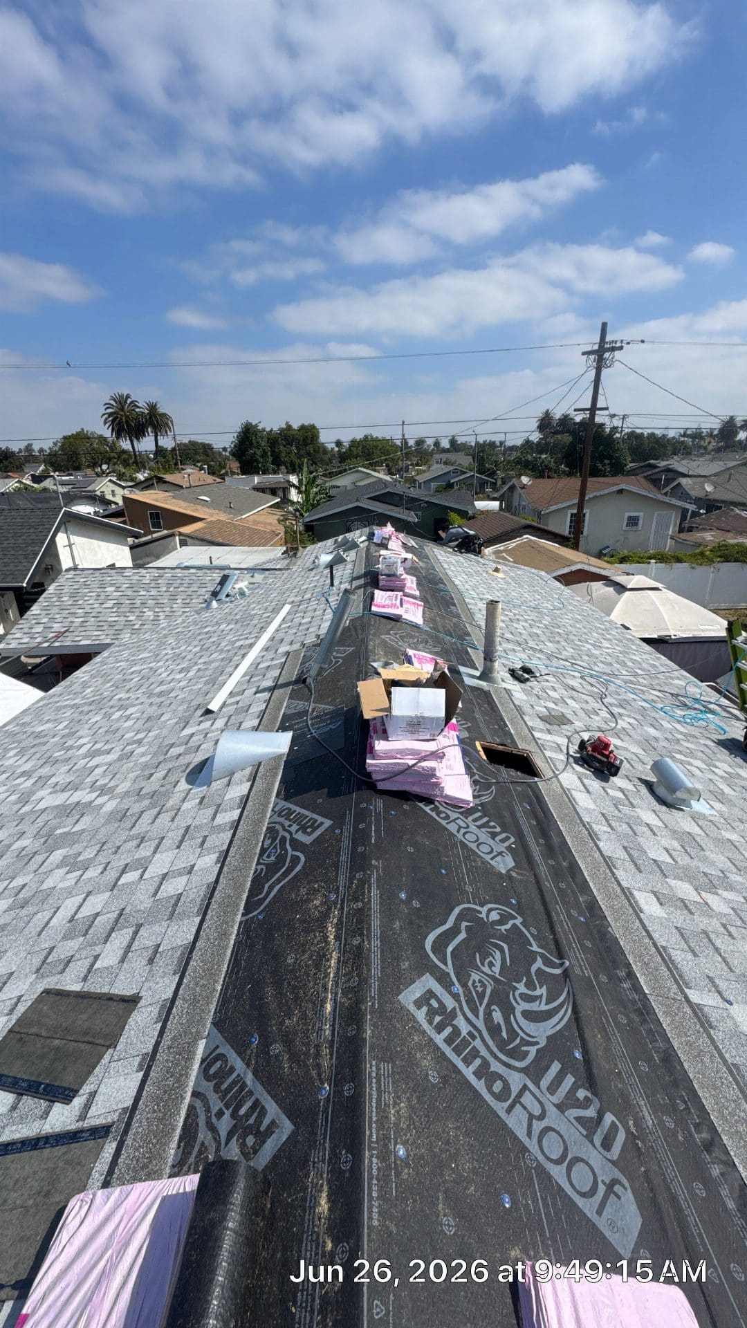 RhinoRoof U20 underlayment installed on ridge, shingles partially complete in North Hollywood | Roof Replacement Inc RhinoRoof U20 underlayment installed on ridge, shingles partially complete — North Hollywood — Roof Replacement Inc