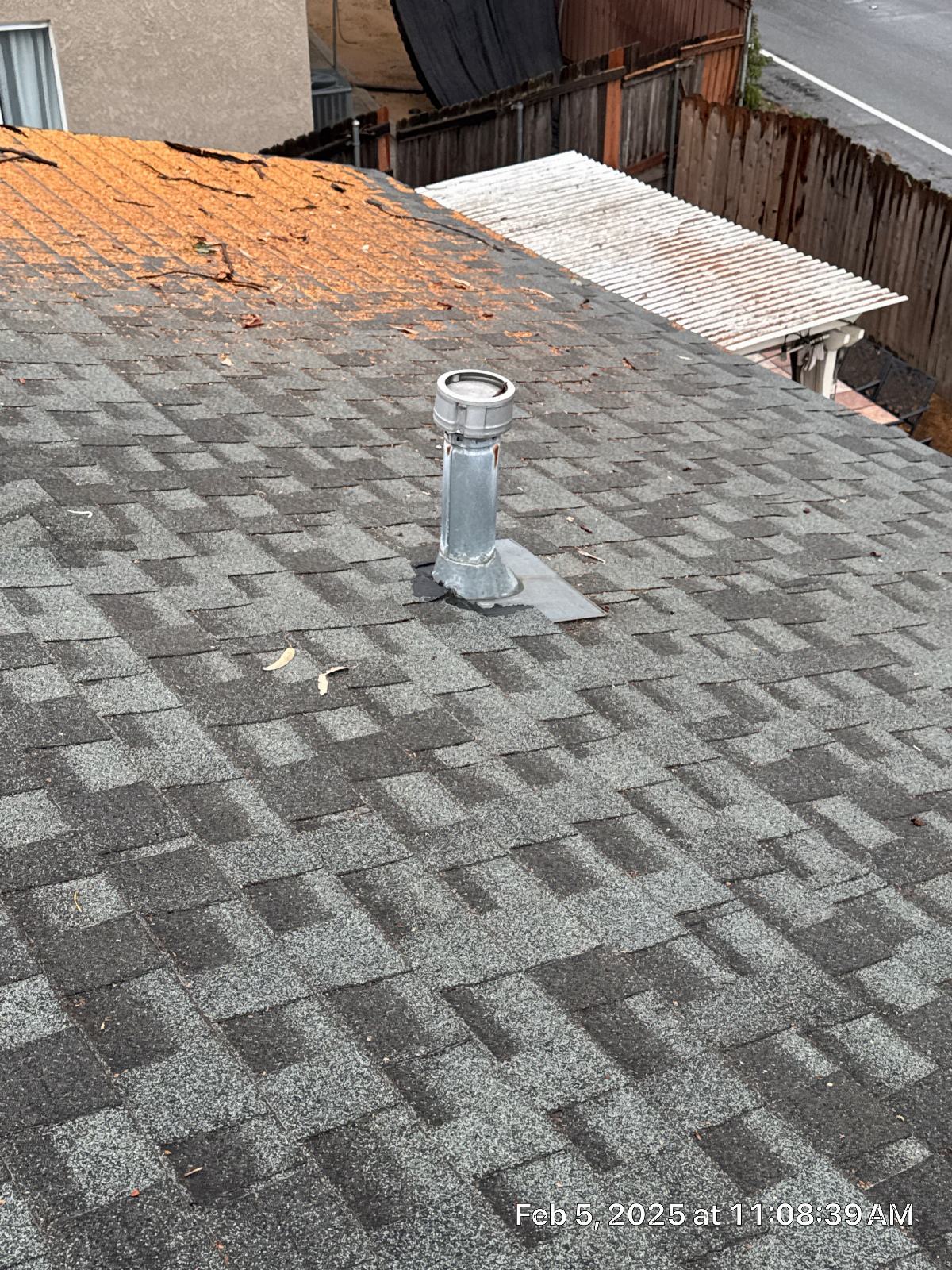 Metal pipe flashing vent on gray asphalt shingle roof in La Crescenta-Montrose | Roof Replacement Inc metal pipe flashing vent on gray asphalt shingle roof — La Crescenta-Montrose — Roof Replacement Inc