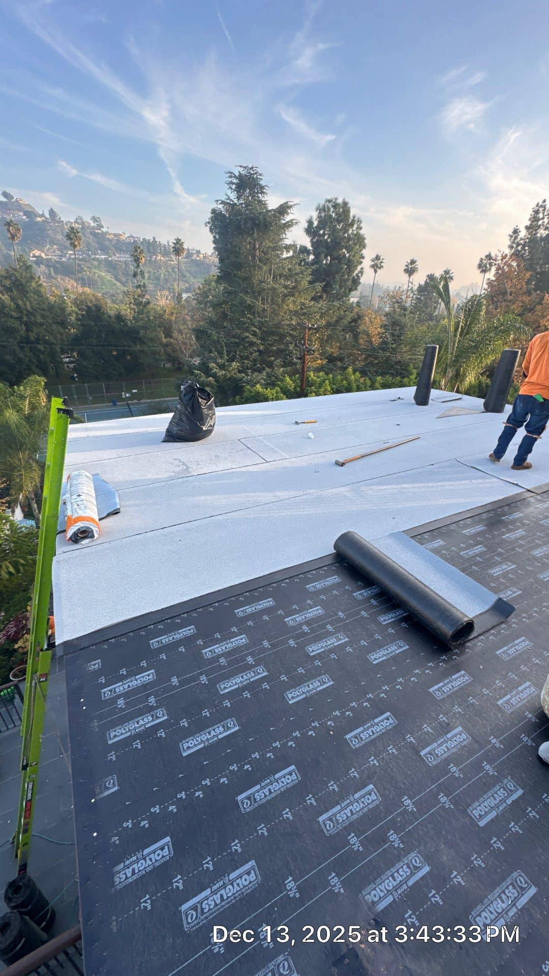 Polyglass underlayment and white cap sheet installation on flat roof in Glendale | Roof Replacement Inc Polyglass underlayment and white cap sheet installation on flat roof — Glendale — Roof Replacement Inc