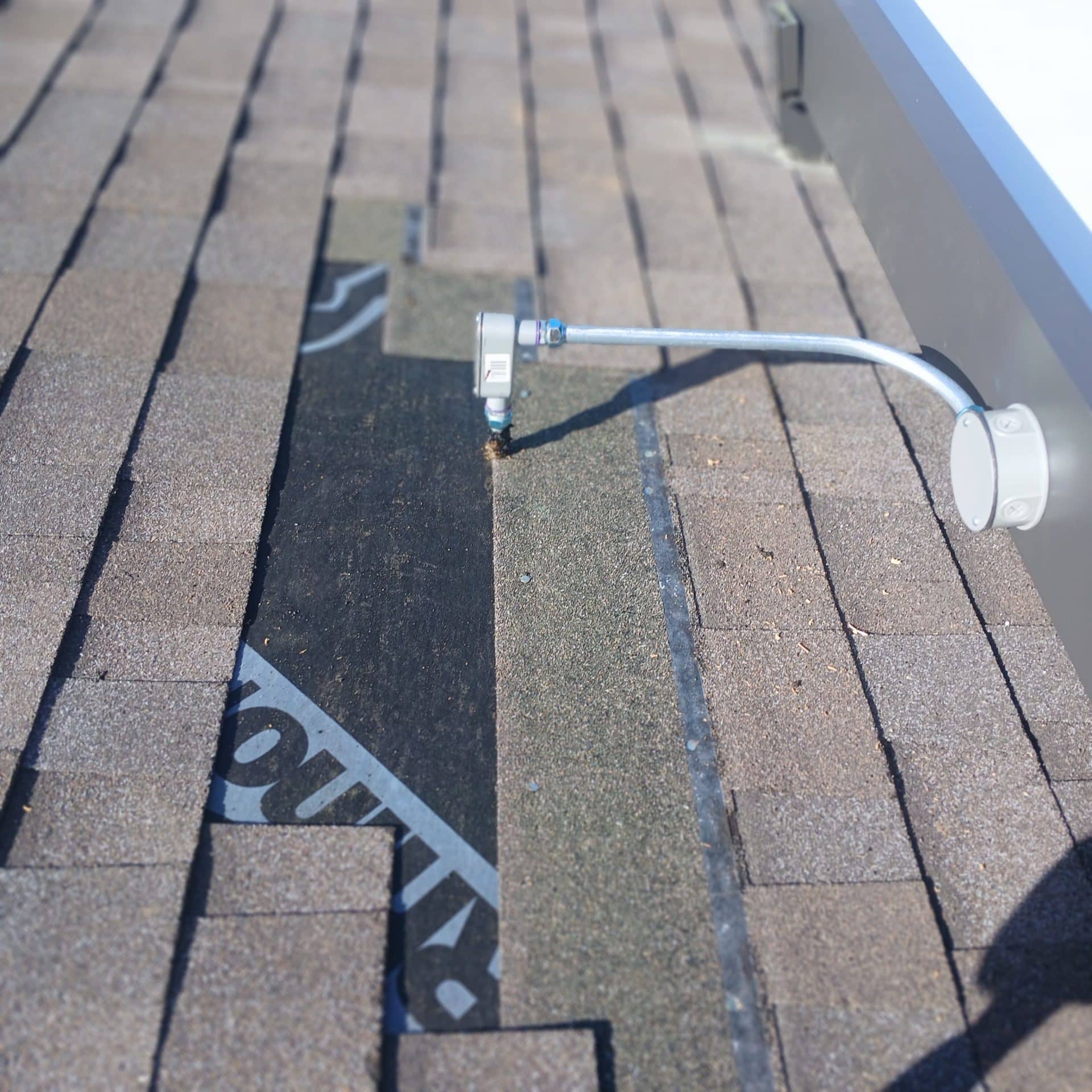 Asphalt shingle roof with conduit mount and junction box on underlayment | Roof Replacement Inc Asphalt shingle roof with conduit mount and junction box on underlayment — Roof Replacement Inc