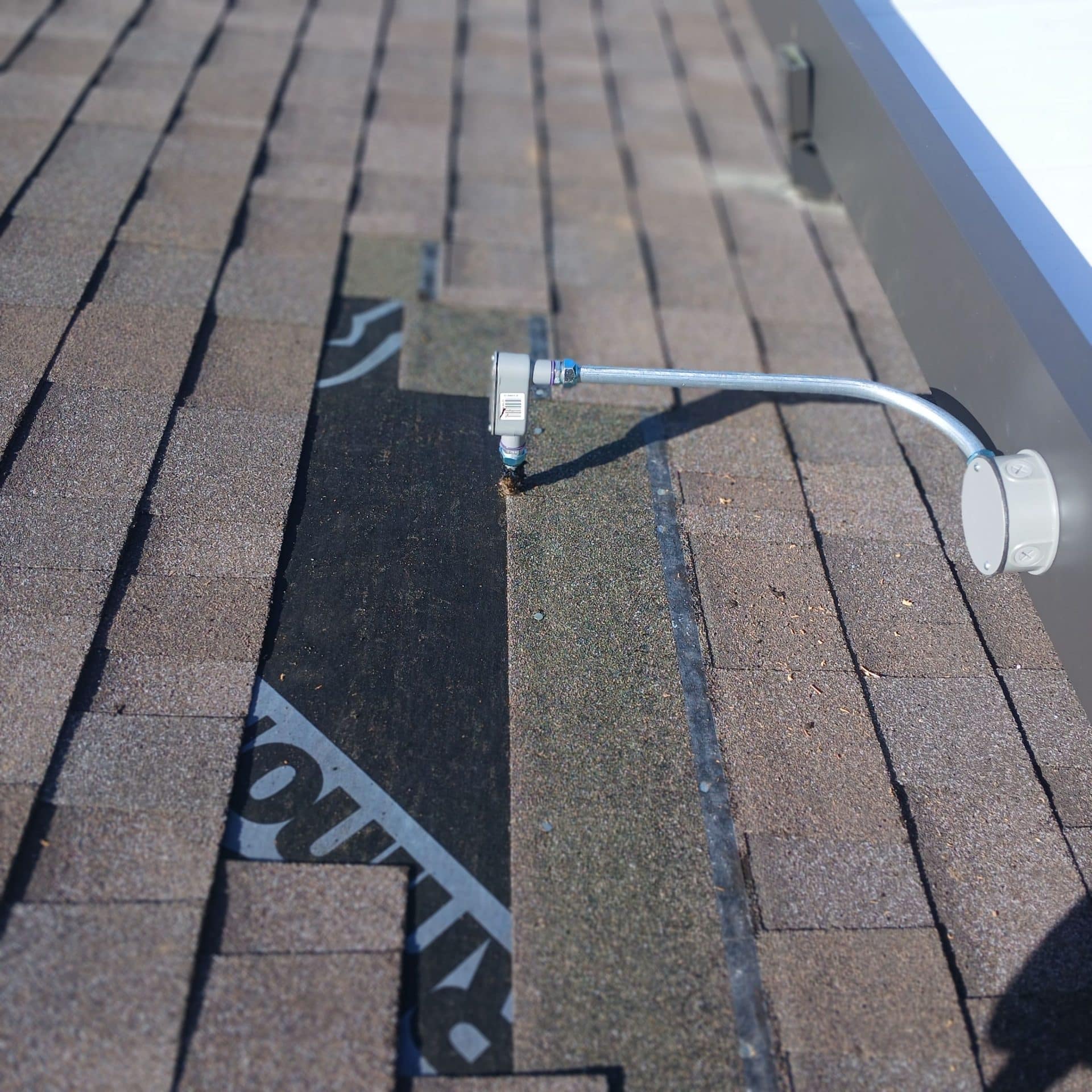 Asphalt shingle roof with conduit mount and junction box on underlayment | Roof Replacement Inc Asphalt shingle roof with conduit mount and junction box on underlayment — Roof Replacement Inc