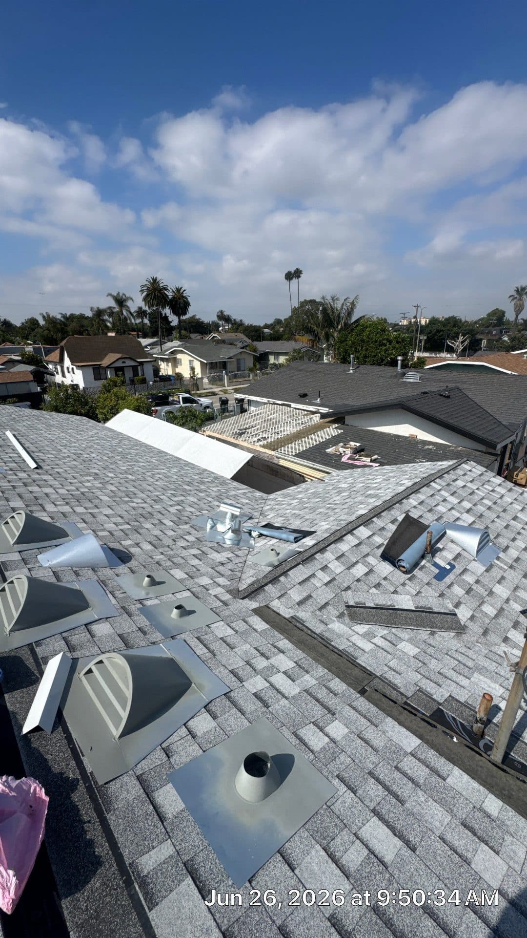 Gray asphalt shingle roof with metal vents and pipe boots installed in North Hollywood | Roof Replacement Inc gray asphalt shingle roof with metal vents and pipe boots installed — North Hollywood — Roof Replacement Inc