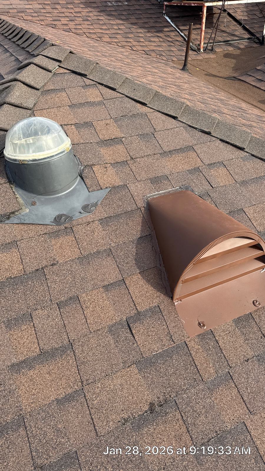 Asphalt shingle roof with tubular skylight and brown metal exhaust vent | Roof Replacement Inc Asphalt shingle roof with tubular skylight and brown metal exhaust vent — Roof Replacement Inc