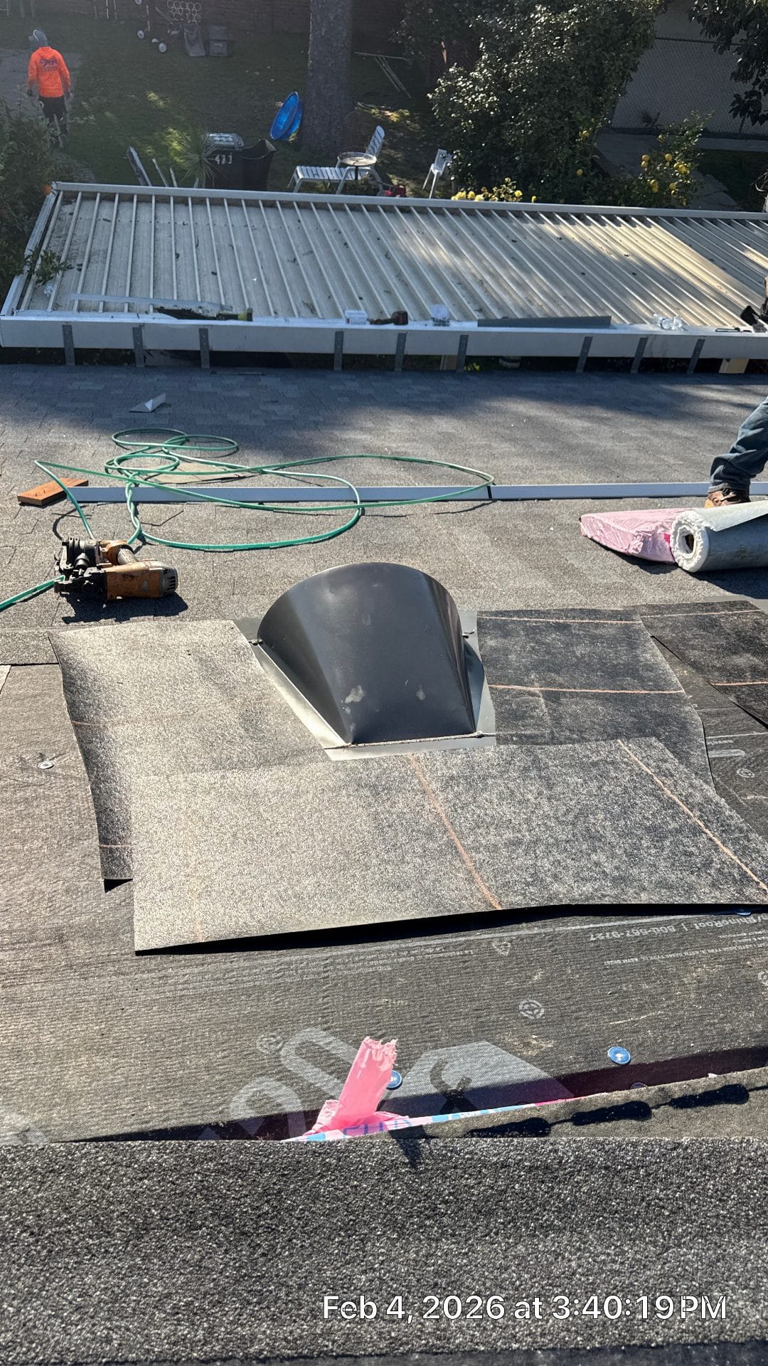 Roof vent boot installed on felt underlayment during shingle installation | Roof Replacement Inc roof vent boot installed on felt underlayment during shingle installation — Roof Replacement Inc