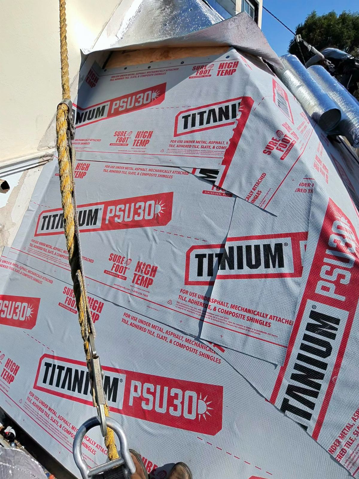 Titanium PSU30 underlayment installed on steep roof deck | Roof Replacement Inc Titanium PSU30 underlayment installed on steep roof deck — Roof Replacement Inc