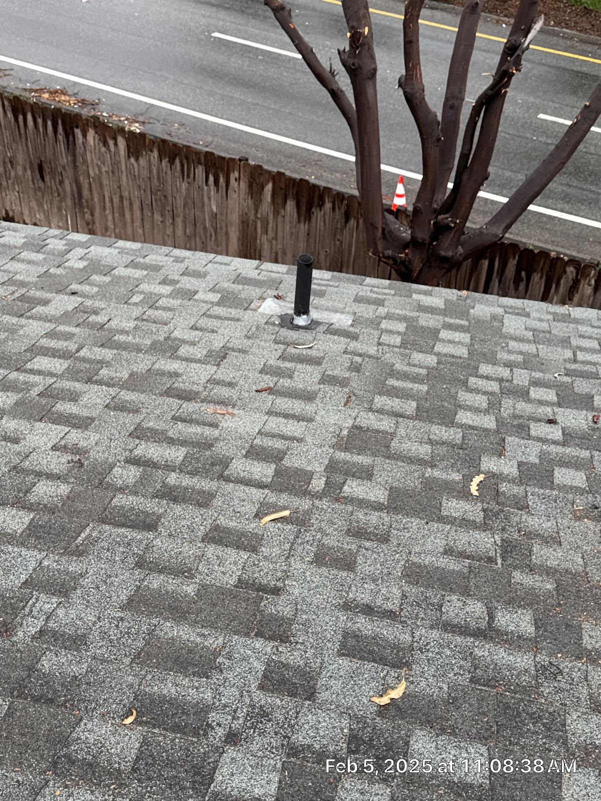 Plumbing vent pipe boot flashing on gray asphalt shingle roof in La Crescenta-Montrose | Roof Replacement Inc plumbing vent pipe boot flashing on gray asphalt shingle roof — La Crescenta-Montrose — Roof Replacement Inc