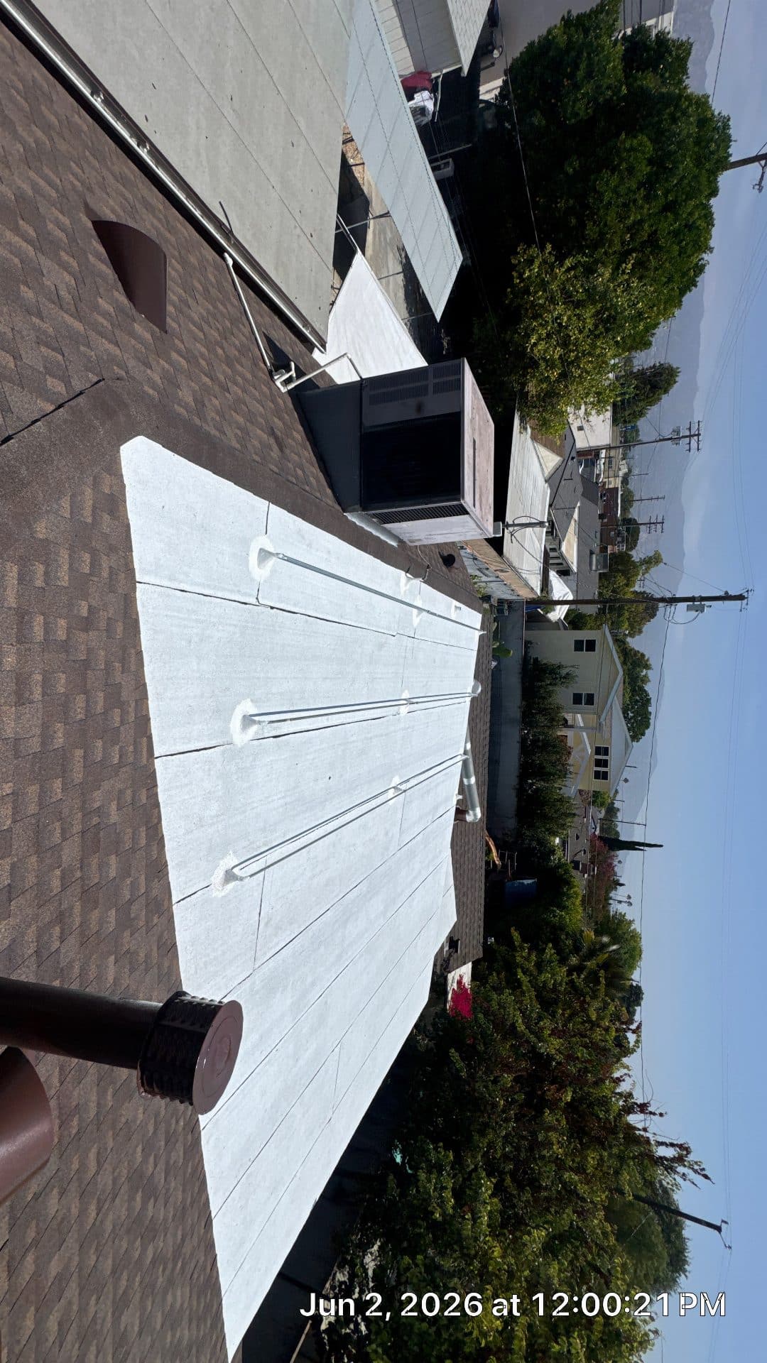 flat roof with white membrane installation and HVAC unit on commercial building — Roof Replacement Inc