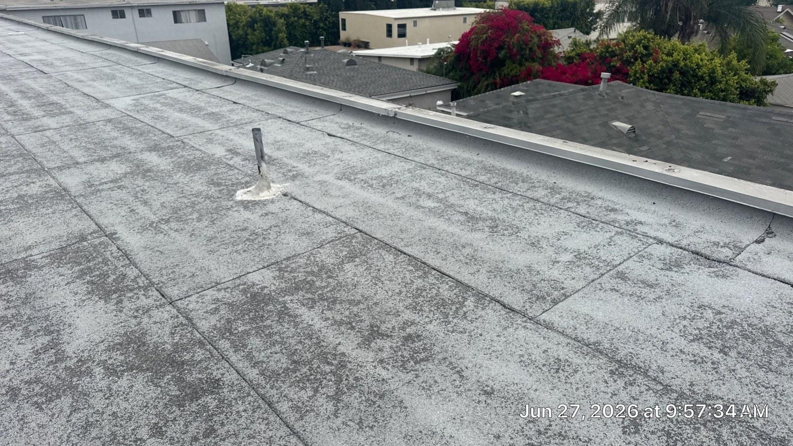Completed cool roof installation work at Roof Replacement Inc
