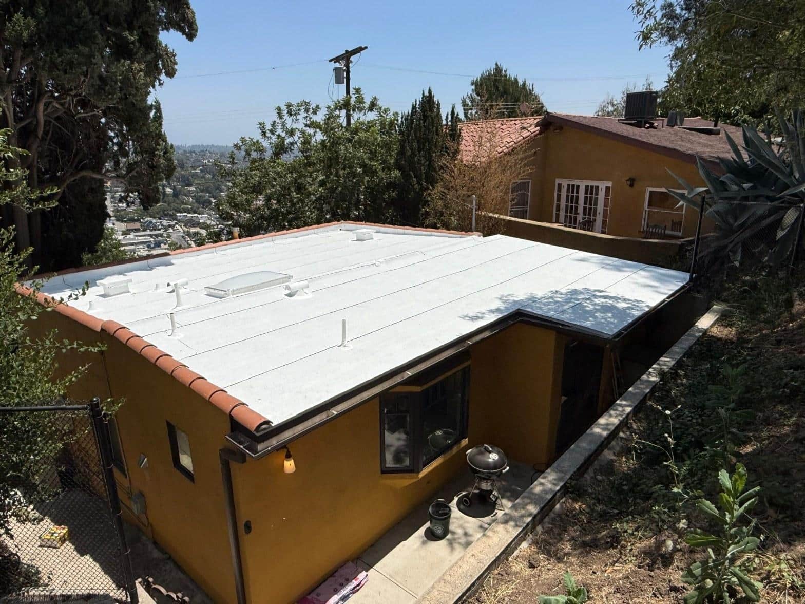 Completed cool roof installation work at Roof Replacement Inc