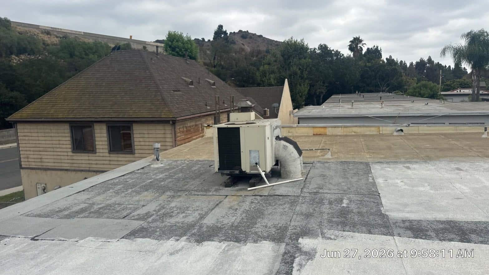Completed cool roof installation work at Roof Replacement Inc