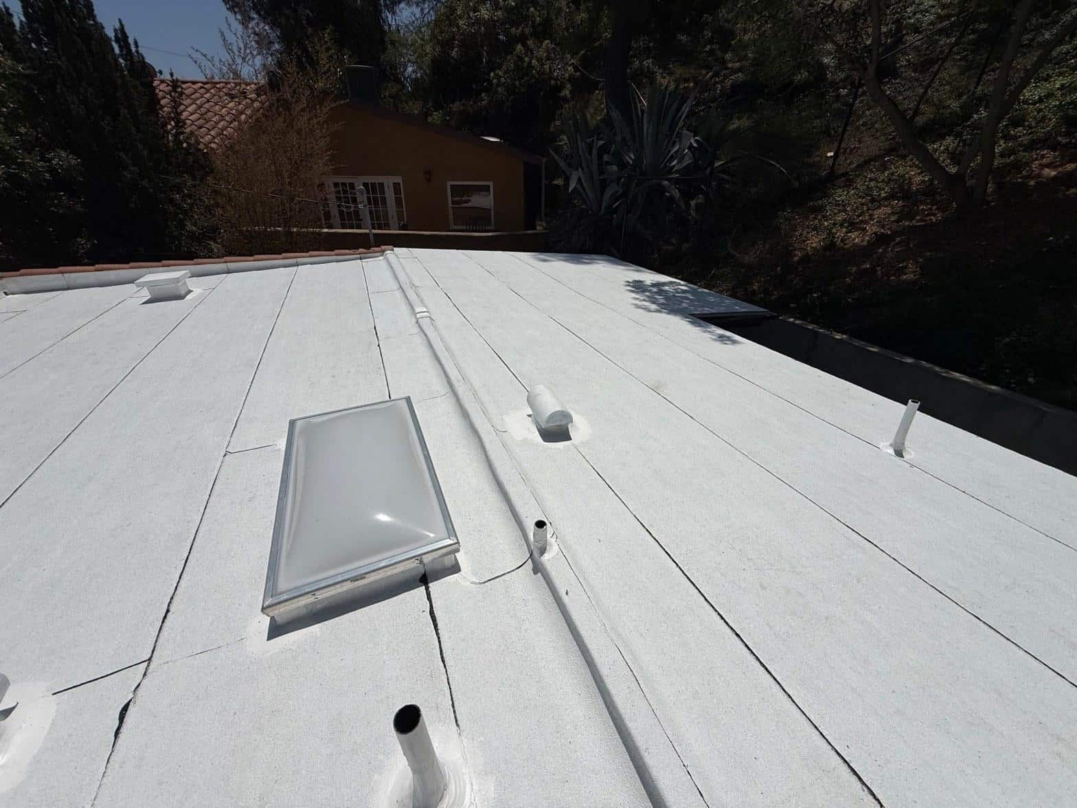 Completed cool roof installation work at Roof Replacement Inc
