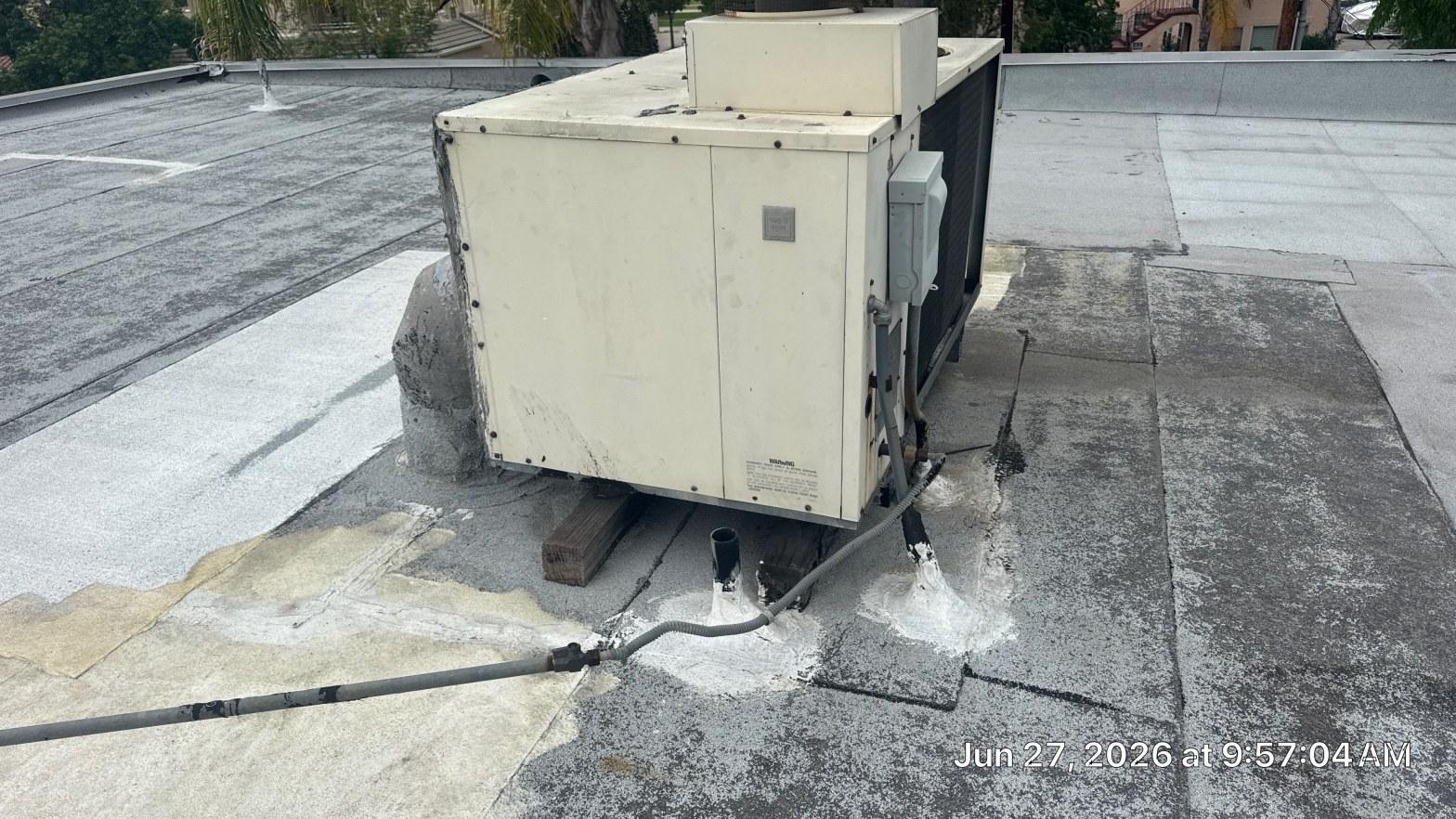 Completed torch down flat roof installation work at Roof Replacement Inc