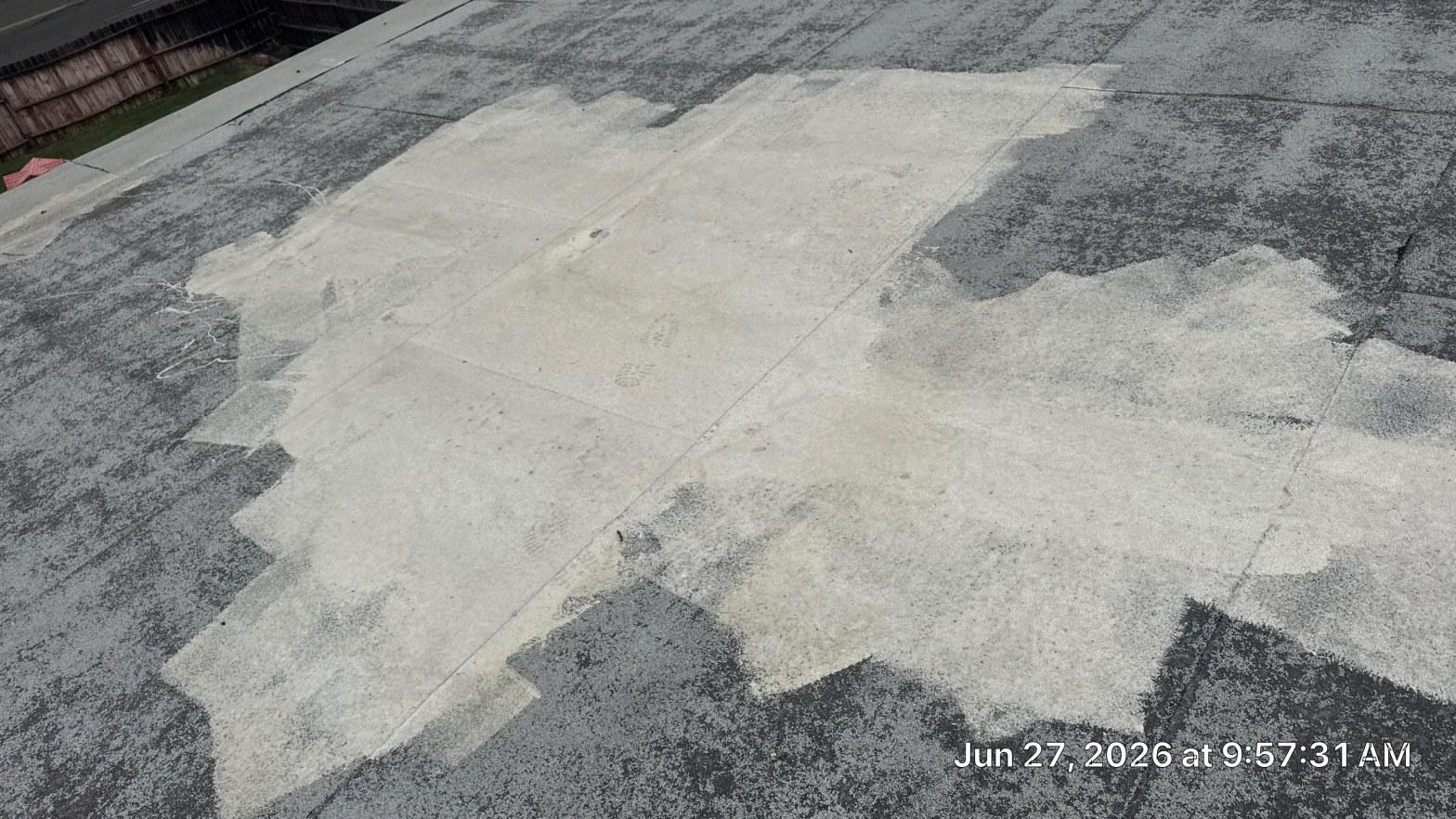 Completed torch down flat roof installation work at Roof Replacement Inc