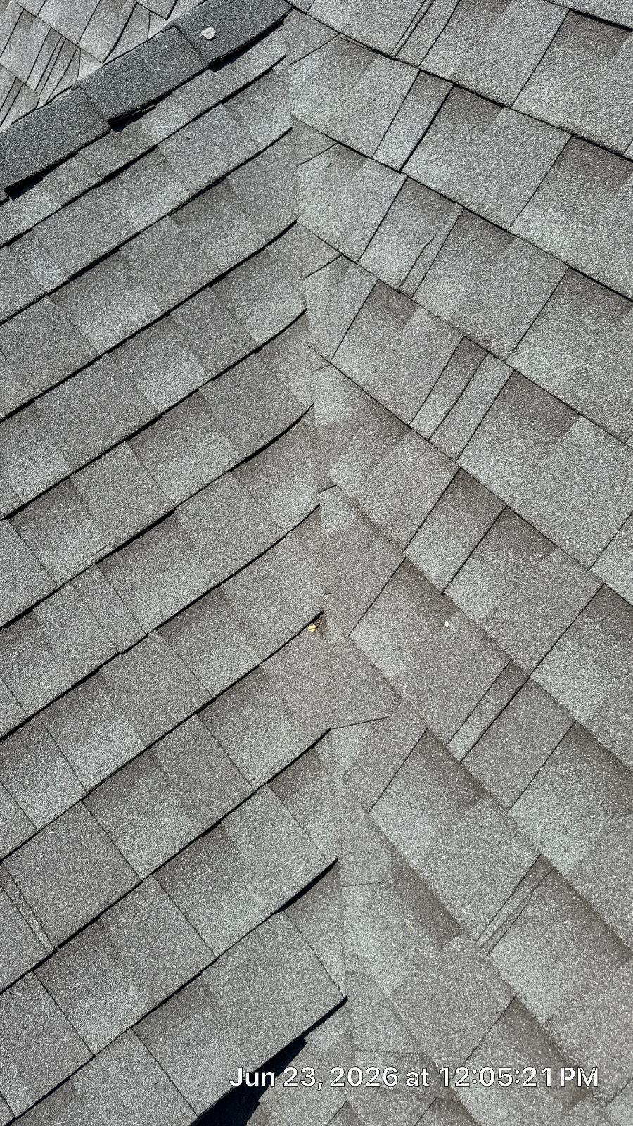 Gray asphalt shingles at roof hip valley junction — Studio City — Roof Replacement Inc