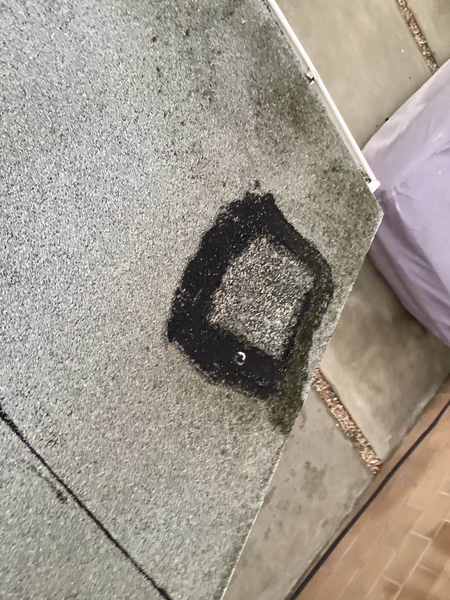 Patched spot sealed with roofing cement on asphalt shingles in Mar Vista | Roof Replacement Inc Patched spot sealed with roofing cement on asphalt shingles — Mar Vista — Roof Replacement Inc
