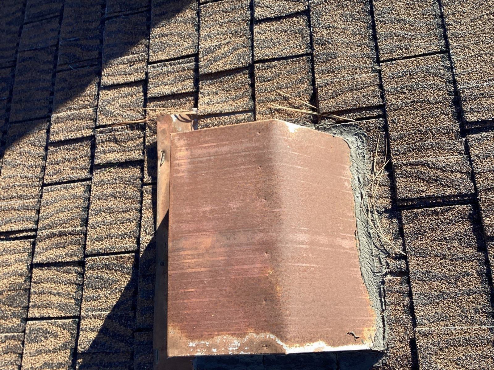 Copper step flashing patch on asphalt shingle roof — Granada Hills — Roof Replacement Inc
