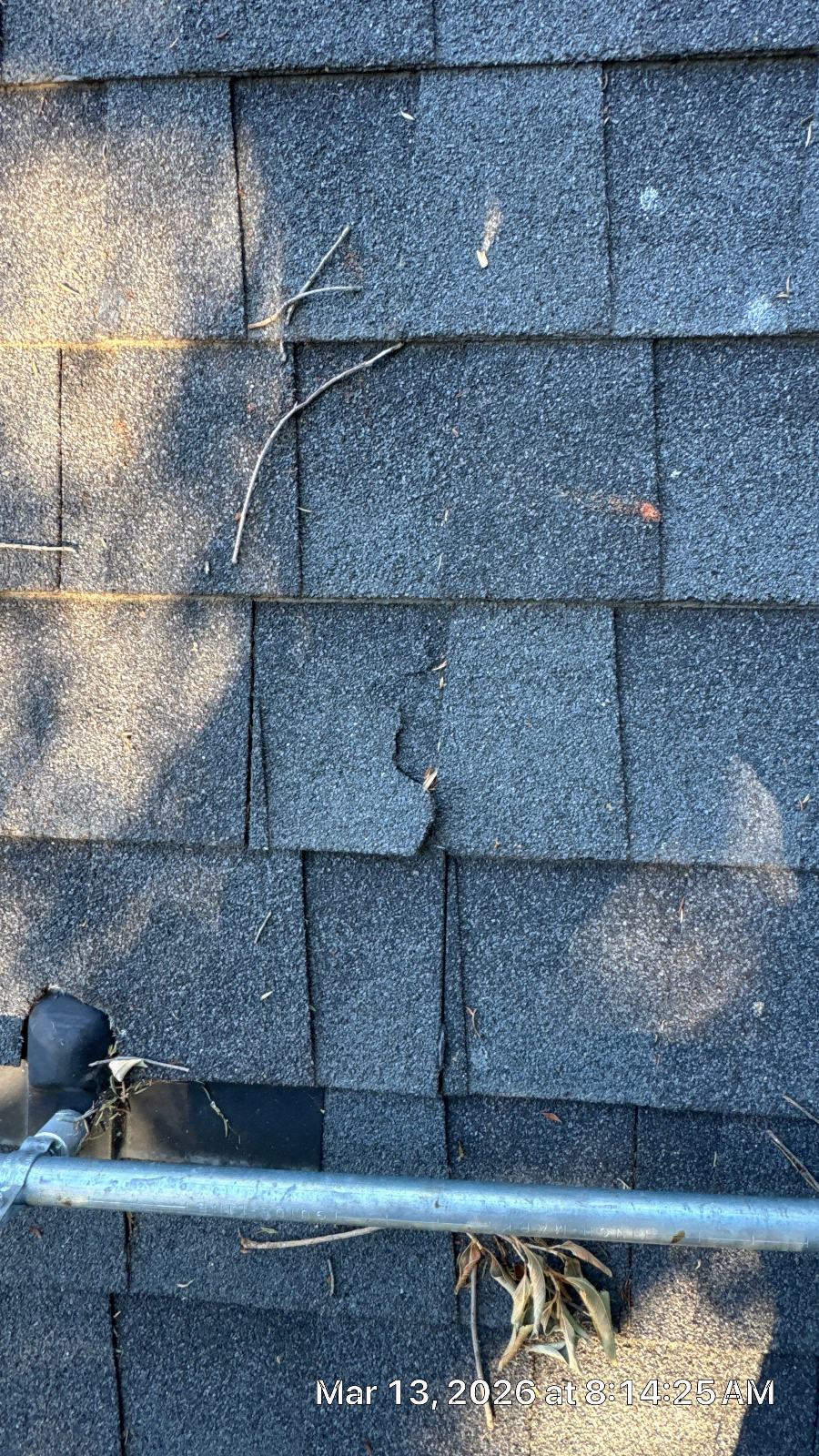 Cracked asphalt shingles near gutter with antenna mount in Sherman Oaks | Roof Replacement Inc Cracked asphalt shingles near gutter with antenna mount — Sherman Oaks — Roof Replacement Inc