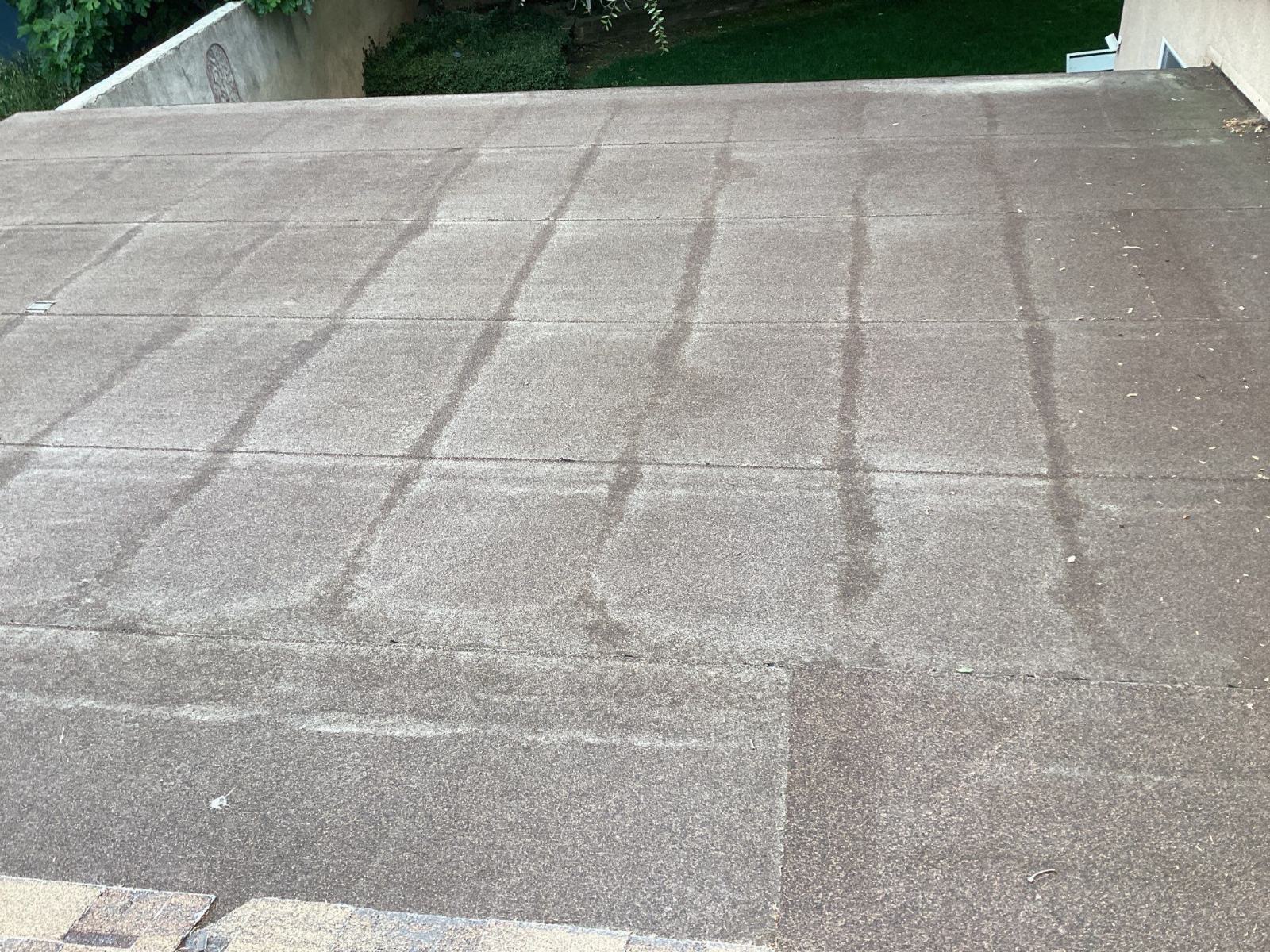 Flat roof covered in granulated cap sheet membrane, grid seam pattern in West Hills | Roof Replacement Inc Flat roof covered in granulated cap sheet membrane, grid seam pattern — West Hills — Roof Replacement Inc